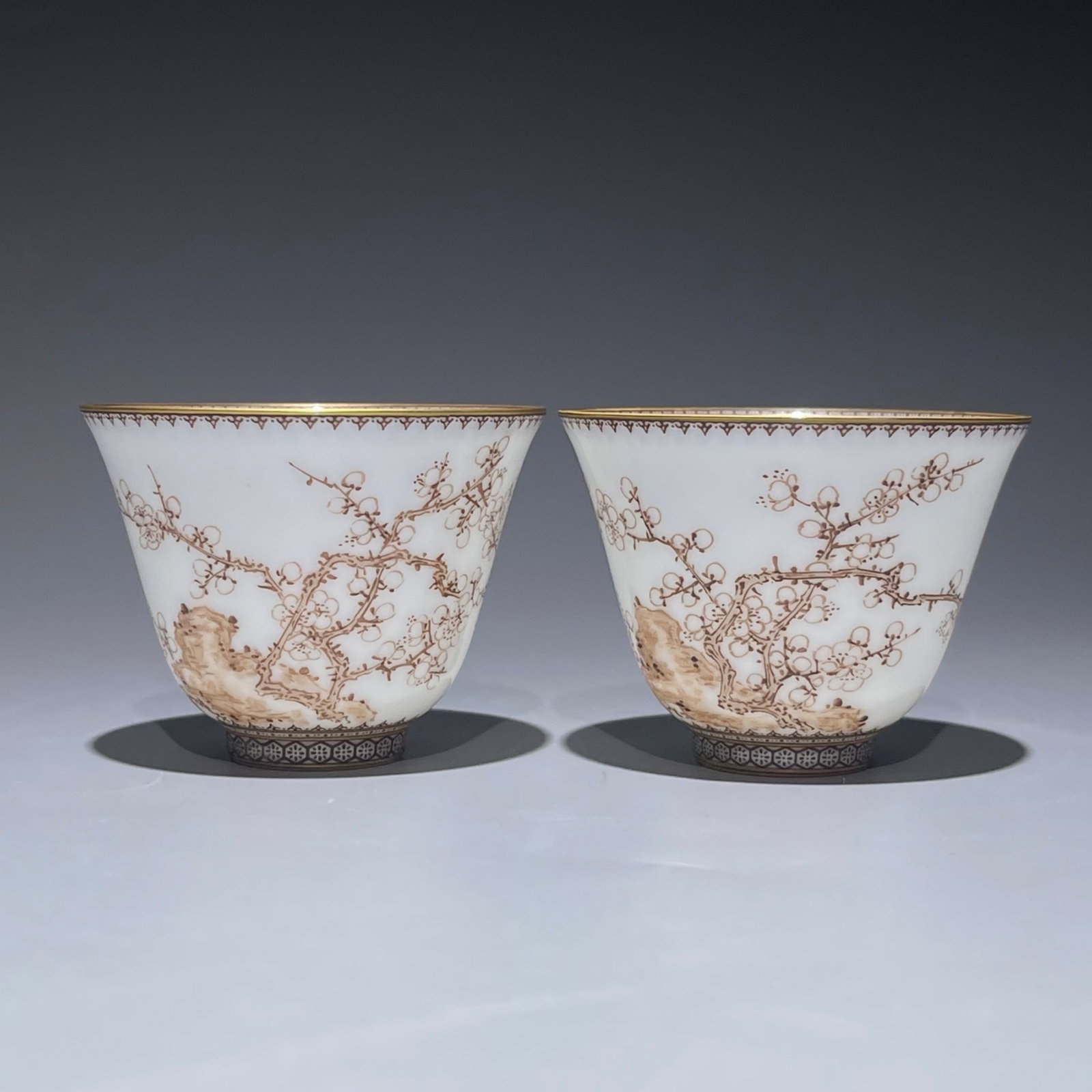 A Pair of Exquisite Ink Color Painted Gold Flower Pattern Cups: A Pair of Exquisite Ink Color Painted Gold Flower Pattern Cups,Qing Dynasty,China,Yongzheng Four-character Mark,Size:1.8inx2.4in 一对墨彩描金花卉纹