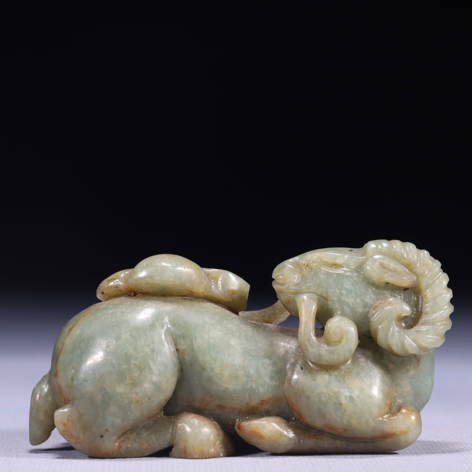 An Exquisite Green Jade Sheep Ornament: An Exquisite Green Jade Sheep Ornament,Qing Dynasty,China,Size:3.3inx1.2inx1.8in,Weight:211g 青玉羊摆件,中国清代