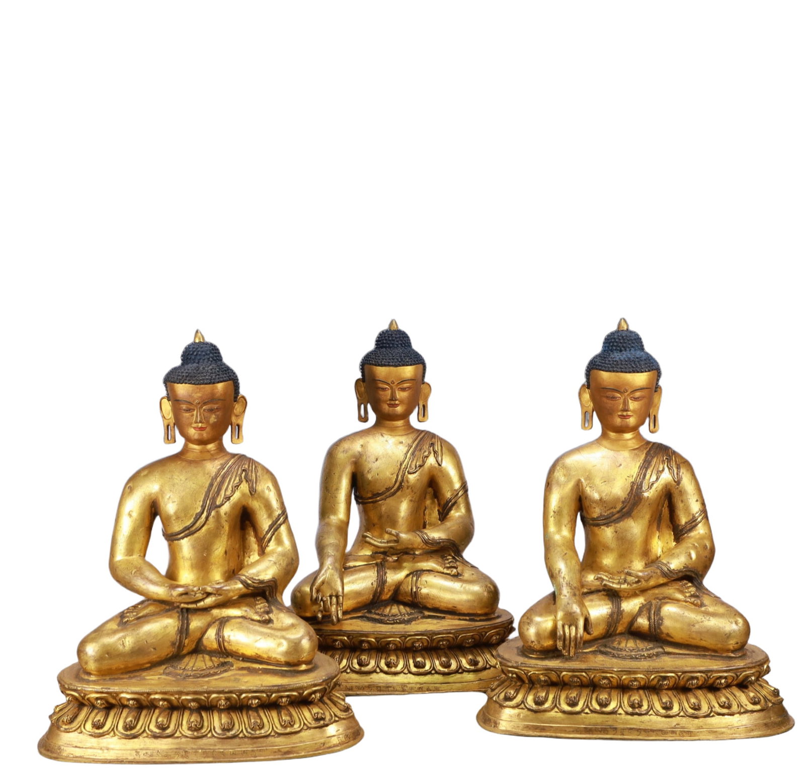 A Set of Solemn Gilt Bronze Statue of Sakyamunies: A Set of Solemn Gilt Bronze Statue of Sakyamunises,Ming Dynasty, China,Size:13.8inx9.1inx17.7in Weight:35850g 一套铜鎏金释迦摩尼像,中&