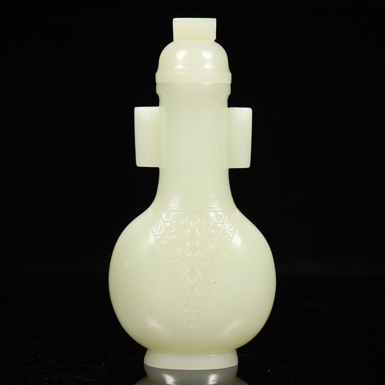 An Exquisite White Jade Flower Pattern Double-Ears Bottle: An Exquisite White Jade Flower Pattern Double-Ears Bottle,Qing Dynasty, China,Size:3.5inx2inx6.7in,Weight:350g 白玉花卉纹双耳盖瓶,中国