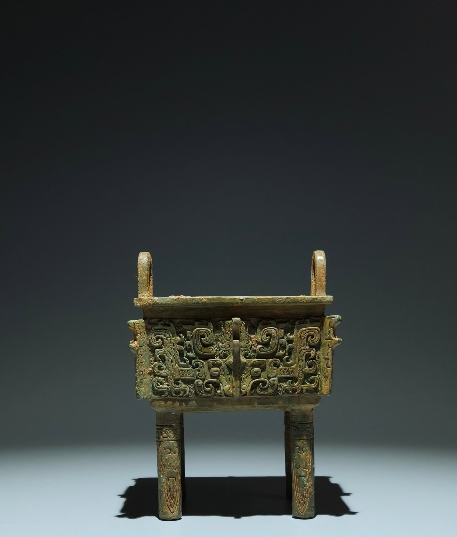 An Archaic Bronze Beast-Face Pattern Double-Ears four legs Censer,With Inscription: An Archaic Bronze Beast-Face Pattern Double-Ears four legs Censer,With Inscription,Shang Dynasty,China,Size:7.5inx5.9inx4.7in