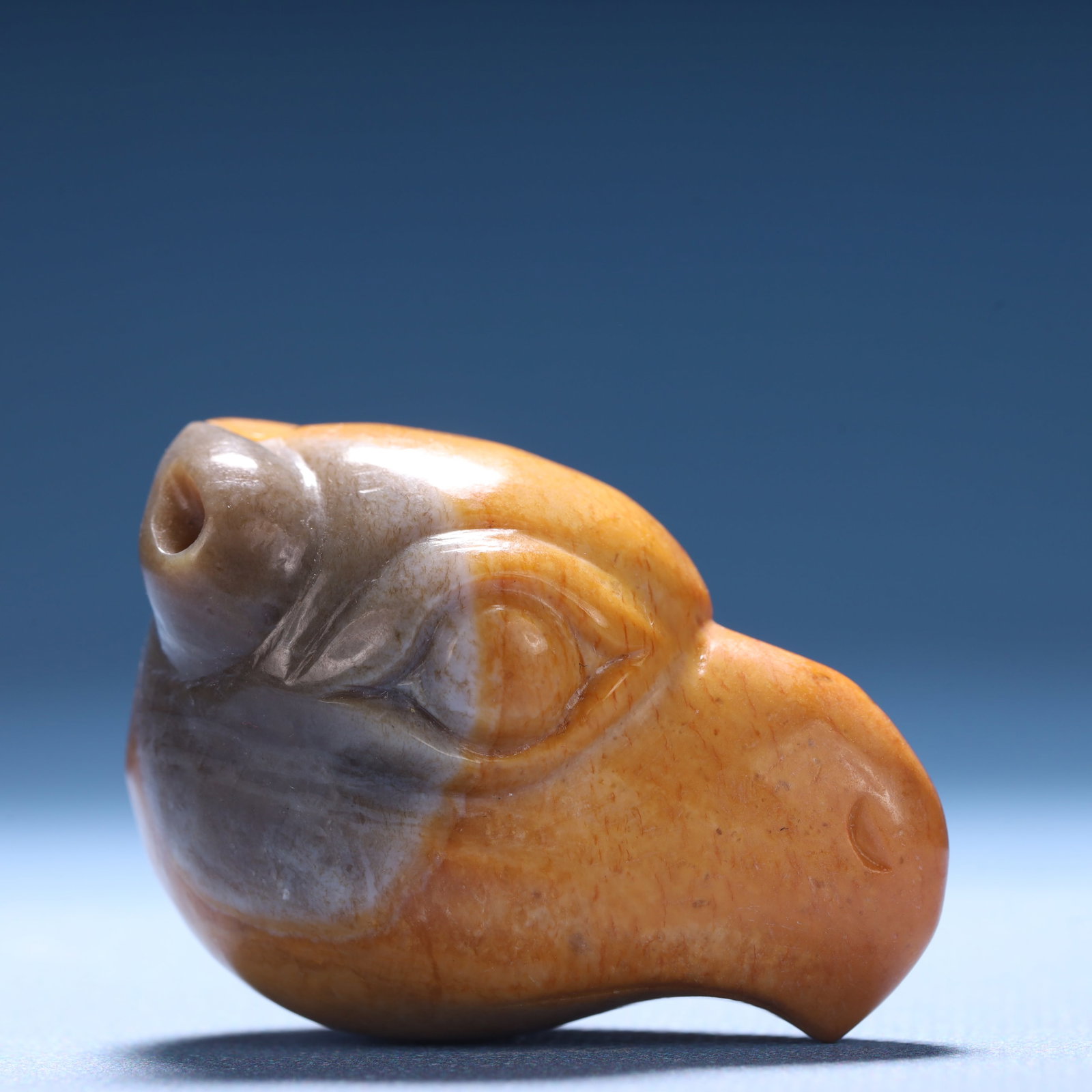An Archaic Hongshan Culture Yellow Jade Bird Ornament: An Archaic Hongshan Culture Yellow Jade Bird Ornament,Ancient Time,China,Size:2inx1.1inx1.3in,Weight:64.6g 红山文化黄玉鸟摆件,中国