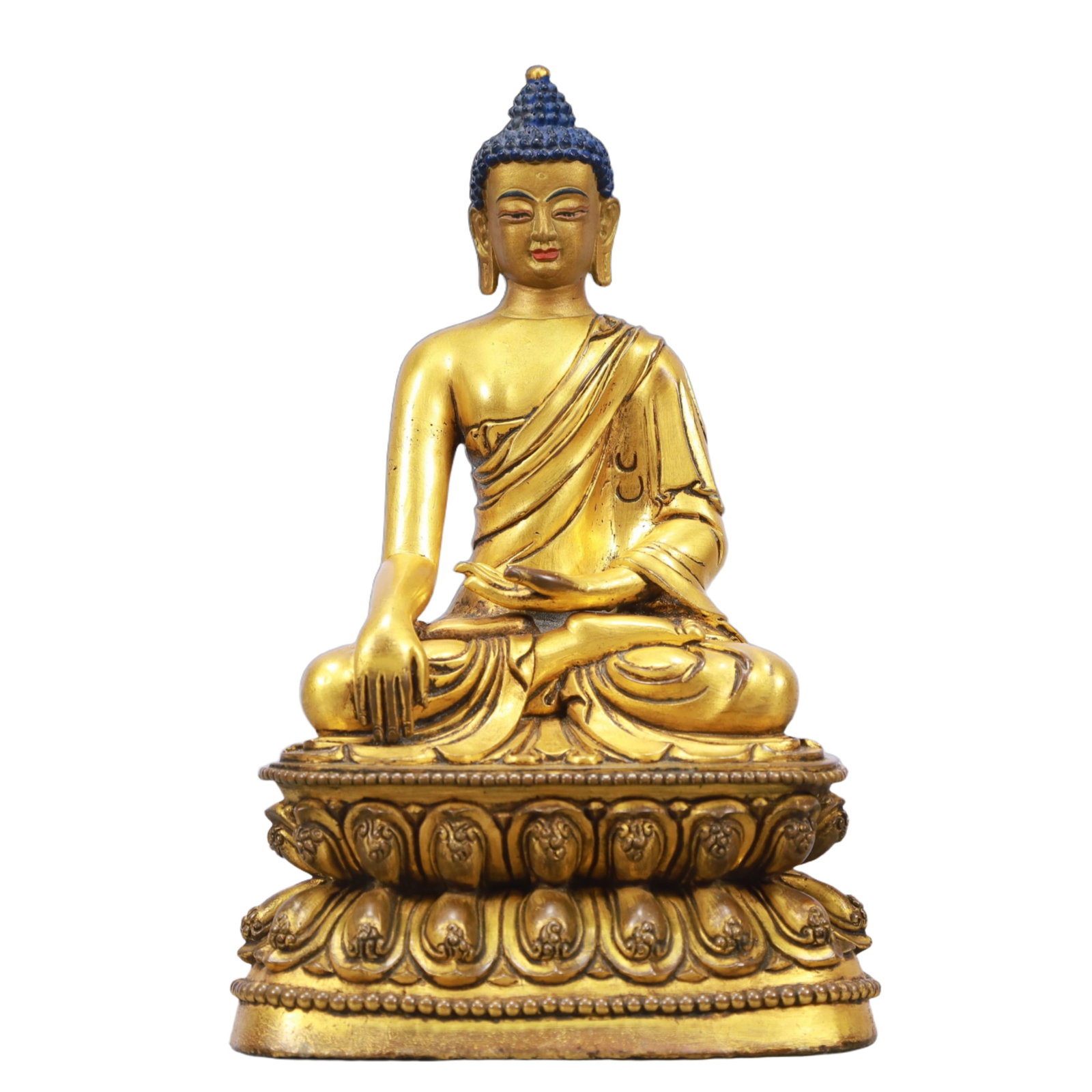 A Solemn Gilt Bronze Statue of Sakyamuni: A Solemn Gilt Bronze Statue of Sakyamuni,Ming Dynasty, China,Size:5.5inx3.9inx8.5in Weight:1750g 铜鎏金释迦摩尼像,中国明代