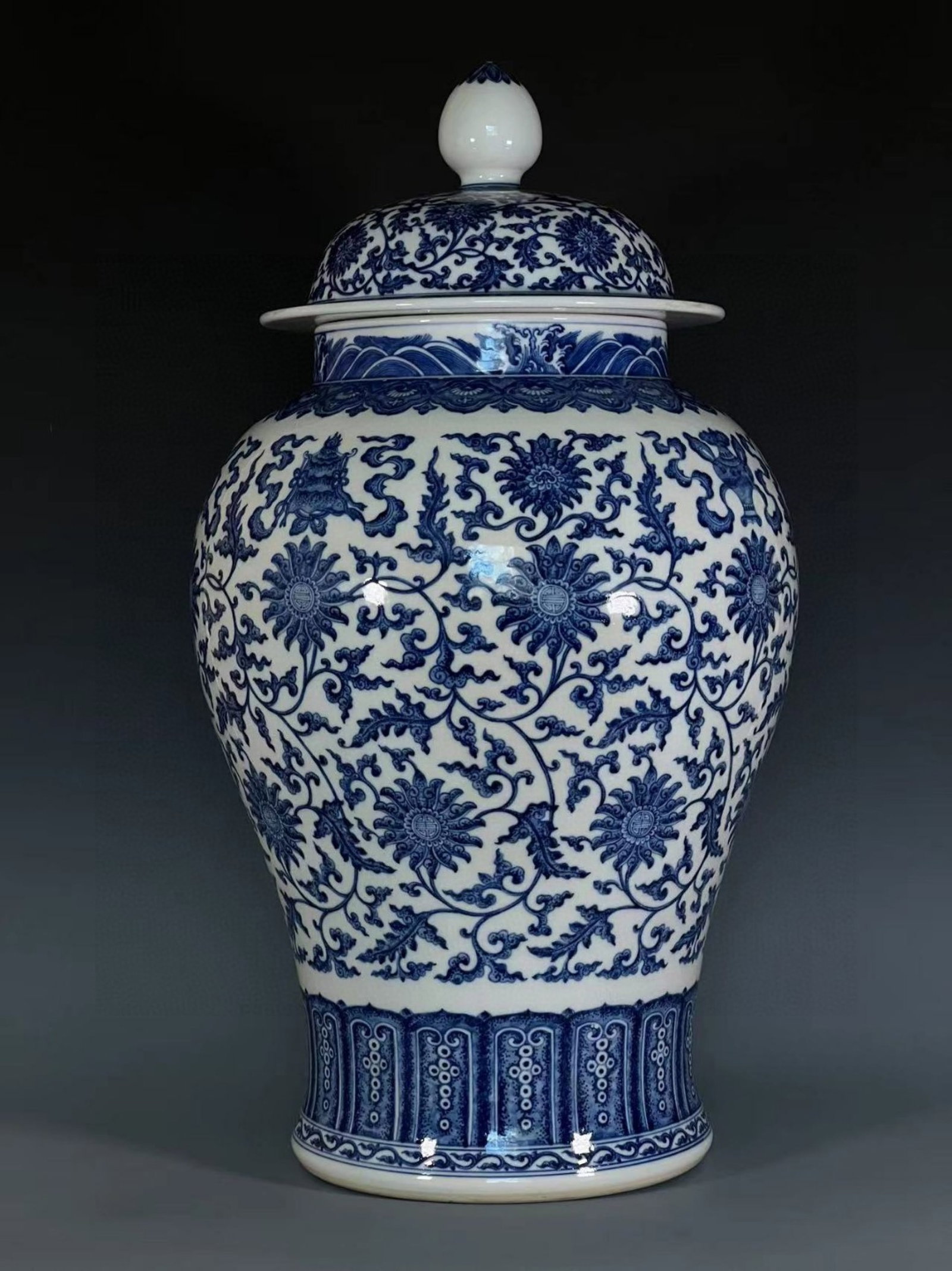 A Huge Blue and White Lotus and Eight Treasures Pattern Jar with Cover: A Huge Blue and White Lotus and Eight Treasures Pattern Jar with Cover,Qing Dynasty,China,Qianlong Six-character Mark,Size:25.6inx9.8in 青花缠枝莲八宝纹