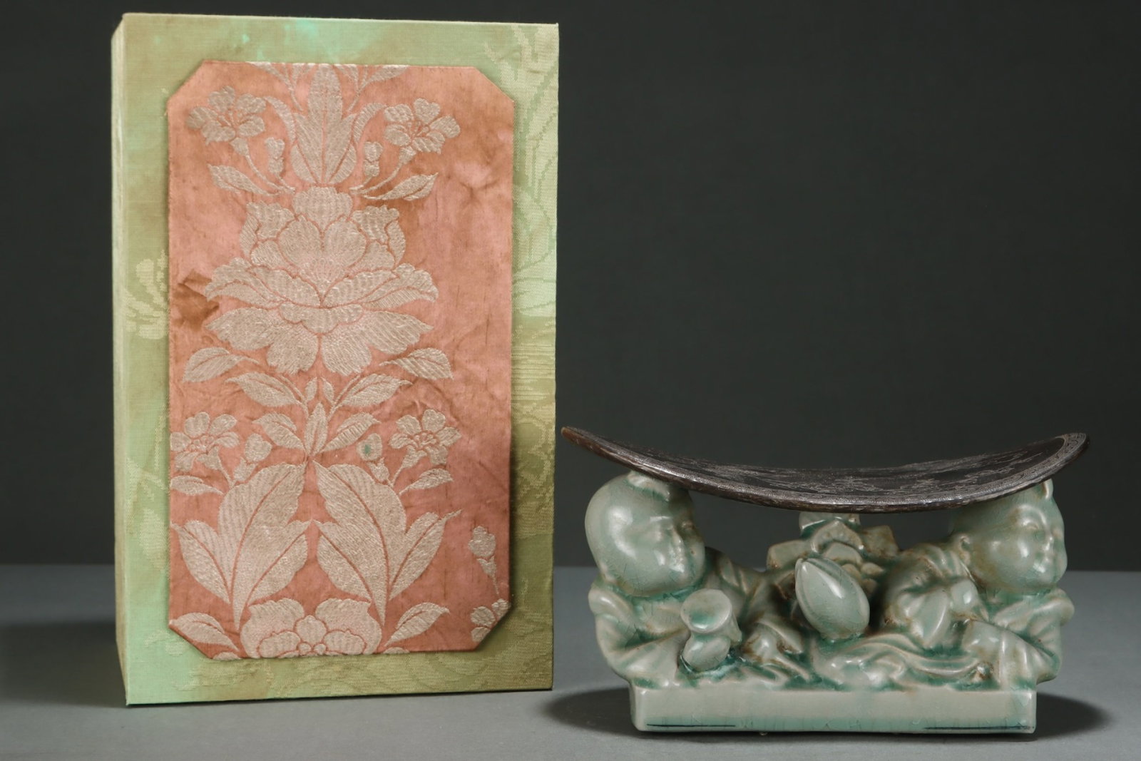 An Exquisite Ru yao Celadon Glazed Cover with Silver Flower and Bird Pattern Pillow: An Exquisite Ru yao Celadon Glazed Cover with Silver Flower and Bird Pattern Pillow,Song Dynasty,China,Size:4.9inx9in 汝窑青釉包银花鸟纹枕&#