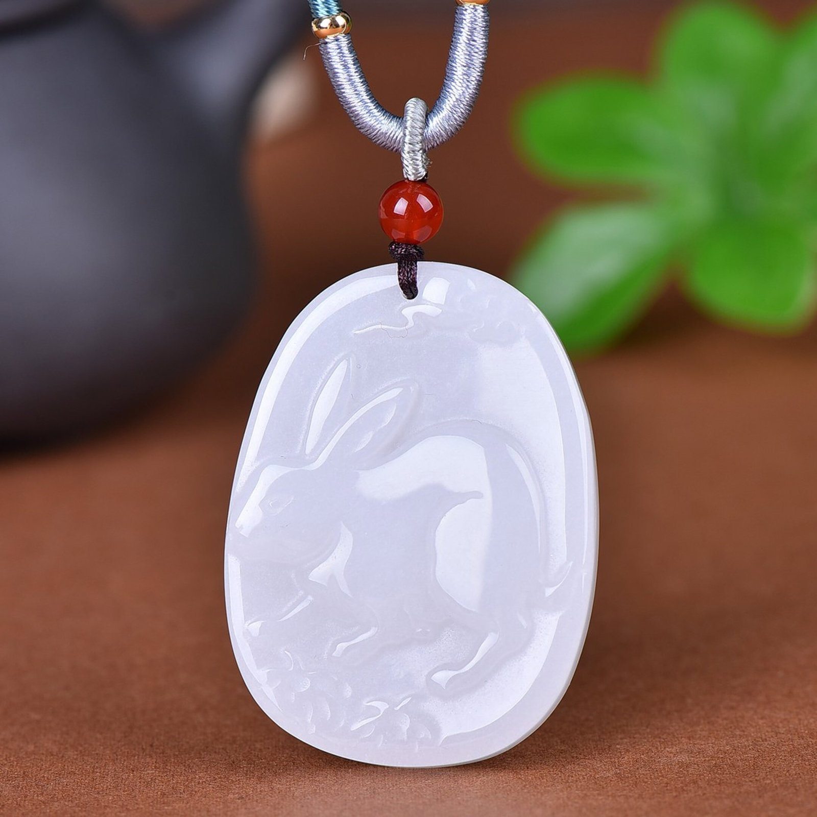 An Exquisite Jadeite Rabbit Pattern Pendant: An Exquisite Jadeite Rabbit Pattern Pendant,Size:35mmx47mm 翡翠兔纹挂件