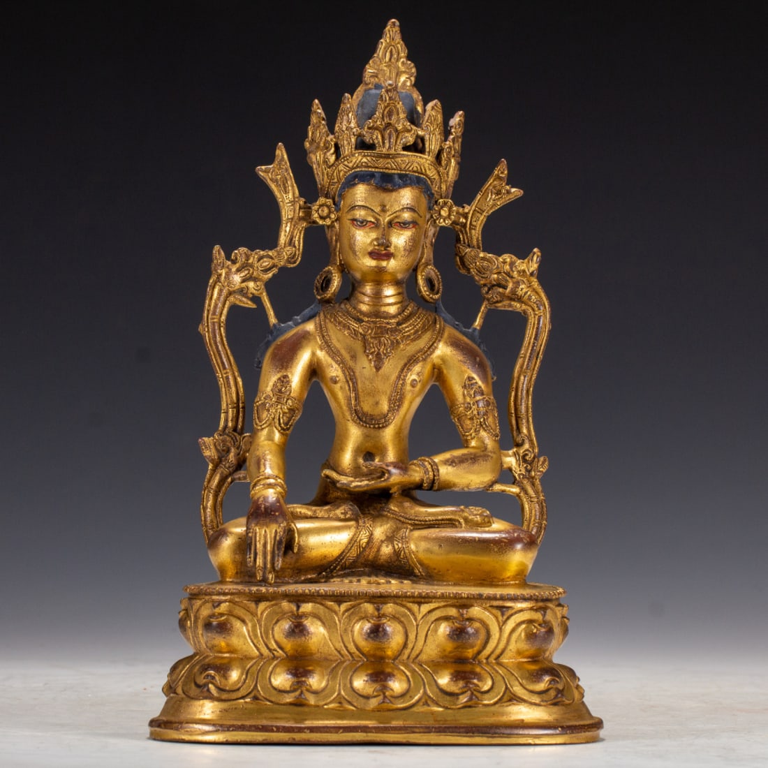 A Solemn Gilt Bronze Statue of Medicine Buddha: A Solemn Gilt Bronze Statue of Medicine Buddha,Qing Dynasty,China,Size:6.1inx3.9inx10.6in,Weight:1760g 铜鎏金药师佛像,中国清代