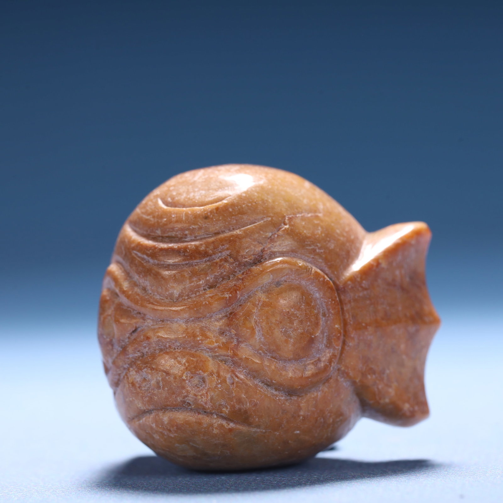 An Archaic Hongshan Culture Yellow Jade Figure Ornament: An Archaic Hongshan Culture Yellow Jade Figure Ornament,Ancient Time,China,Size:1.4inx1.6inx1.2in,Weight:64.2g 红山文化黄玉人物摆件,中