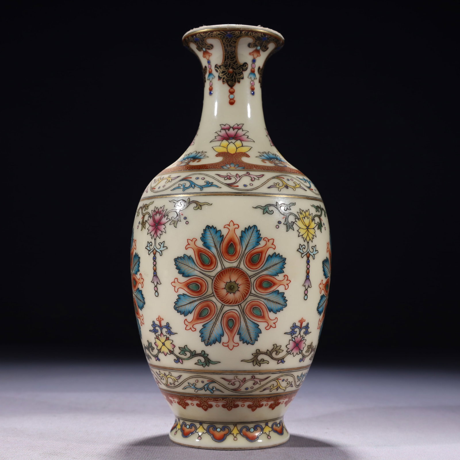 An Exquisite Yellow Ground Enamel Lotus Pattern Vase: An Exquisite Yellow Ground Enamel Lotus Pattern Vase,Qing Dynasty,China,Qianlong Six-character Mark,Size:3.9inx8.3in,Weight:900g 黄地珐琅彩缠枝莲纹