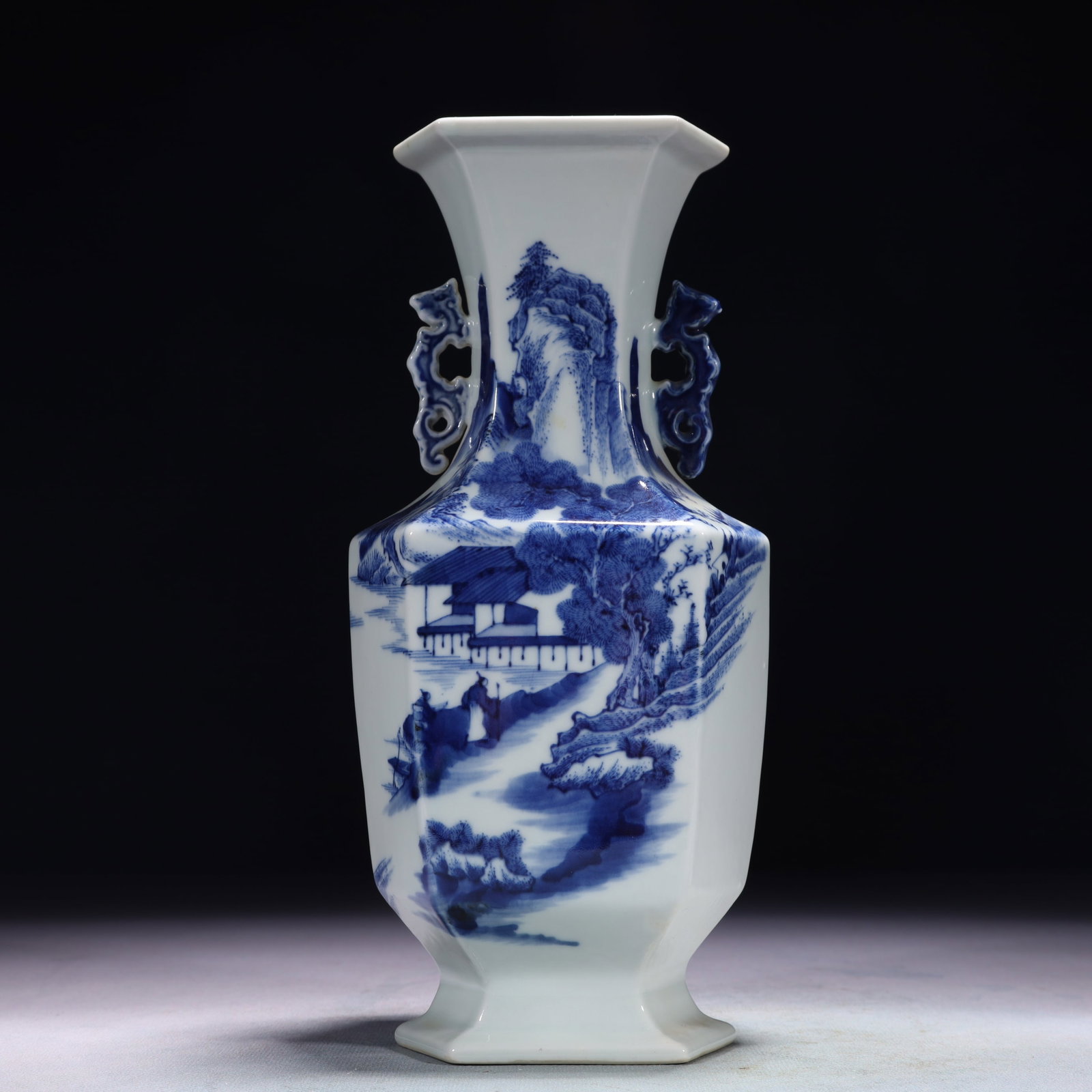 An Exquisite Blue and White Landscape and Figure Pattern Double-Ears Vase: An Exquisite Blue and White Landscape and Figure Pattern Double-Ears Vase,Qing Dynasty,China,Qianlong Six-character Mark,Size:4.3inx3.5inx9.4in,Weight:750g 青花山水人