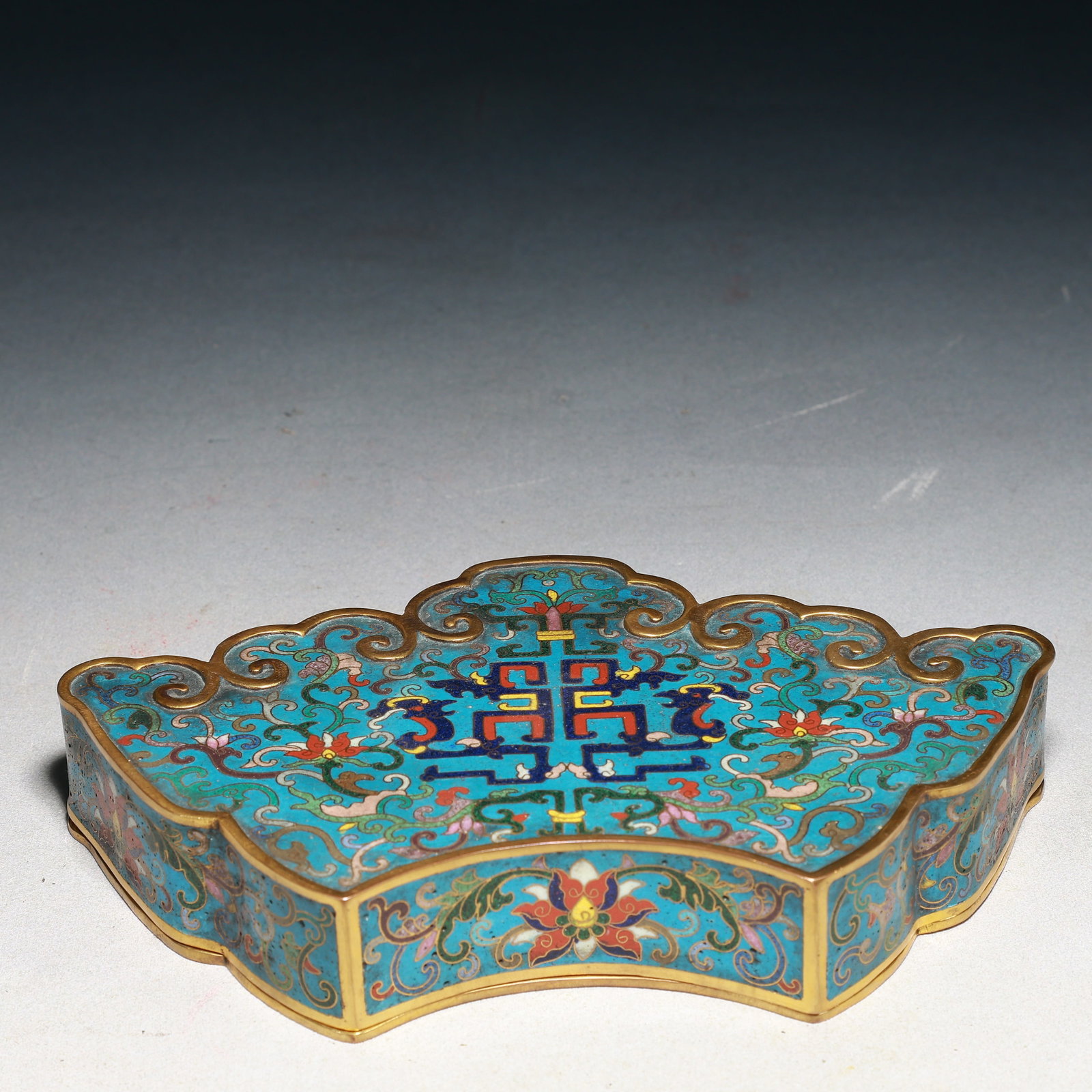 An Exquisite Cloisonne Lotus Pattern Box with Cover,With Inkstone,With Poem: An Exquisite Cloisonne Lotus Pattern Box with Cover,With Inkstone,With Poem,Qing Dynasty,China,Qianlong Four-character Mark,Size:8.3inx4.7inx1.4in,Weight:1700g 景泰蓝缠枝
