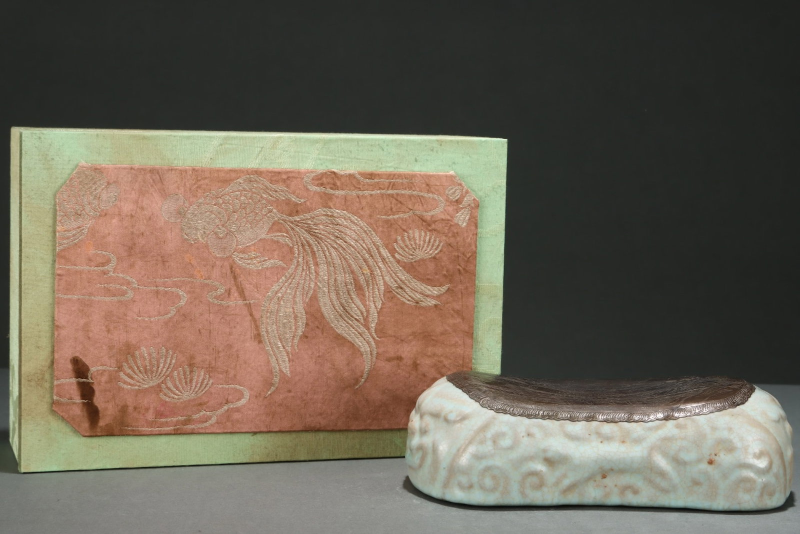 An Exquisite Ru yao Celadon Glazed Cover with Silver Buddha Statue Pattern Pillow: An Exquisite Ru yao Celadon Glazed Cover with Silver Buddha Statue Pattern Pillow,Song Dynasty,China,Size:2.7inx8.9in
