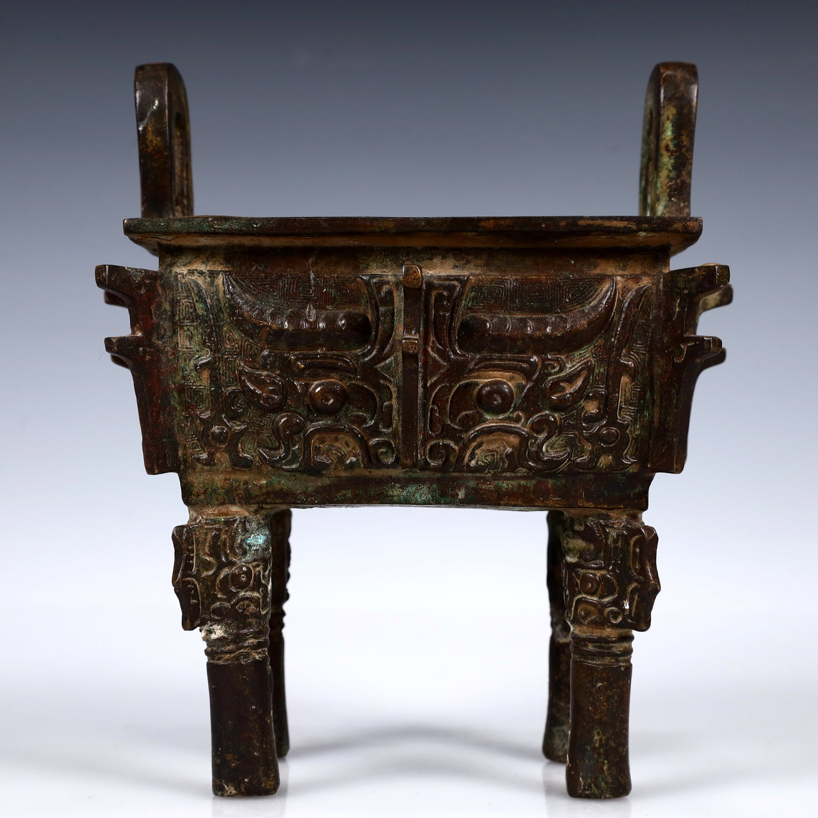 A Rare Bronze Beast-Face Pattern Ding: A Rare Bronze Beast-Face Pattern Ding,W.Zhou,China,Size:6.3inx5.1inx7.1in,Weight:1400g 青铜兽面纹鼎,中国西周时期