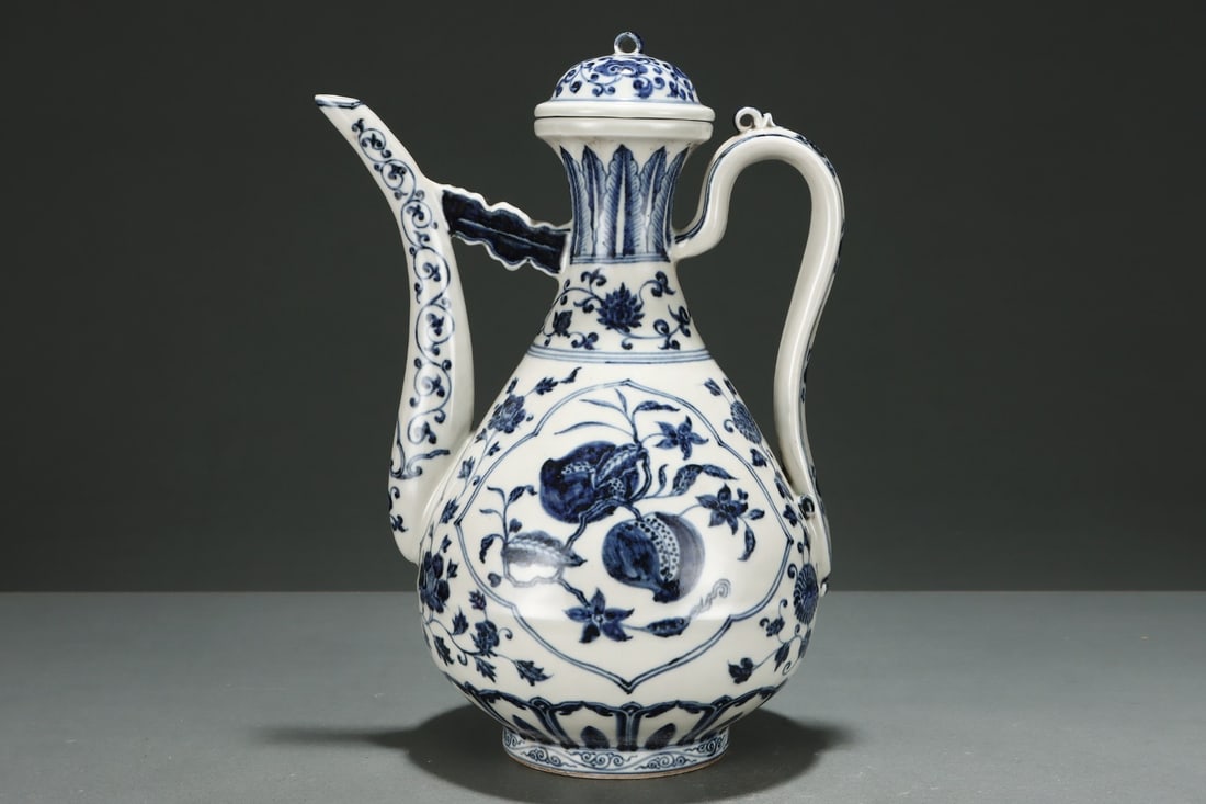 A Rare Blue and white ewer decorated with scrolling lotus and fruiting sprays: A Rare Blue and white ewer decorated with scrolling lotus and fruiting sprays,Ming Dynasty, China,Size:12.8inx9.3in