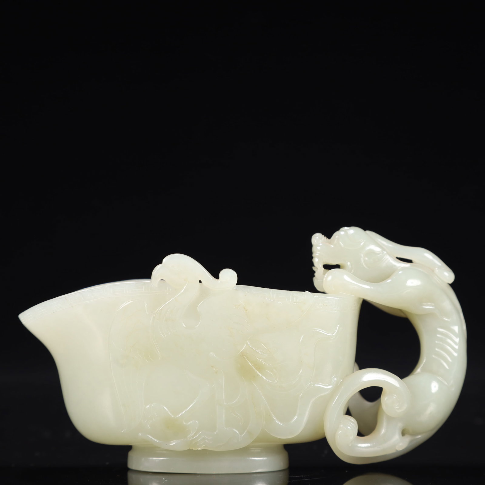 An Exquisite White Jade Dragon and Phoenix Pattern Cup: An Exquisite White Jade Dragon and Phoenix Pattern Cup,Qing Dynasty, China,Size:4.9inx2.4inx2.4in,Weight:250g 白玉龙凤纹杯,中国清代