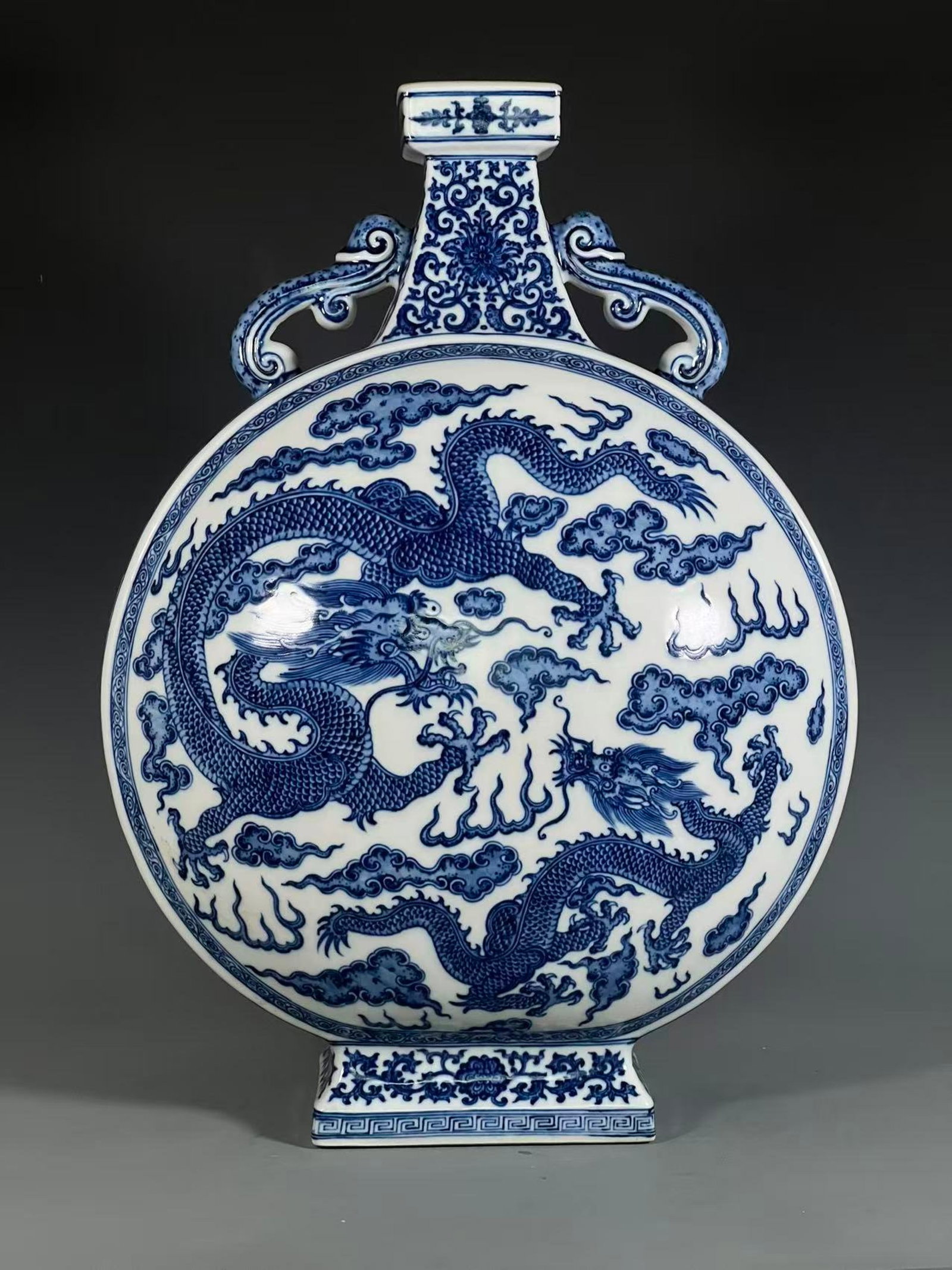 A Huge Blue and White Auspicious Cloud and Dragon Pattern Double-Ears Vase: A Huge Blue and White Auspicious Cloud and Dragon Pattern Double-Ears Vase,Qing Dynasty,China,Yongzheng Six-character Mark,Size:21.7inx7in 青花祥云龙纹双ň