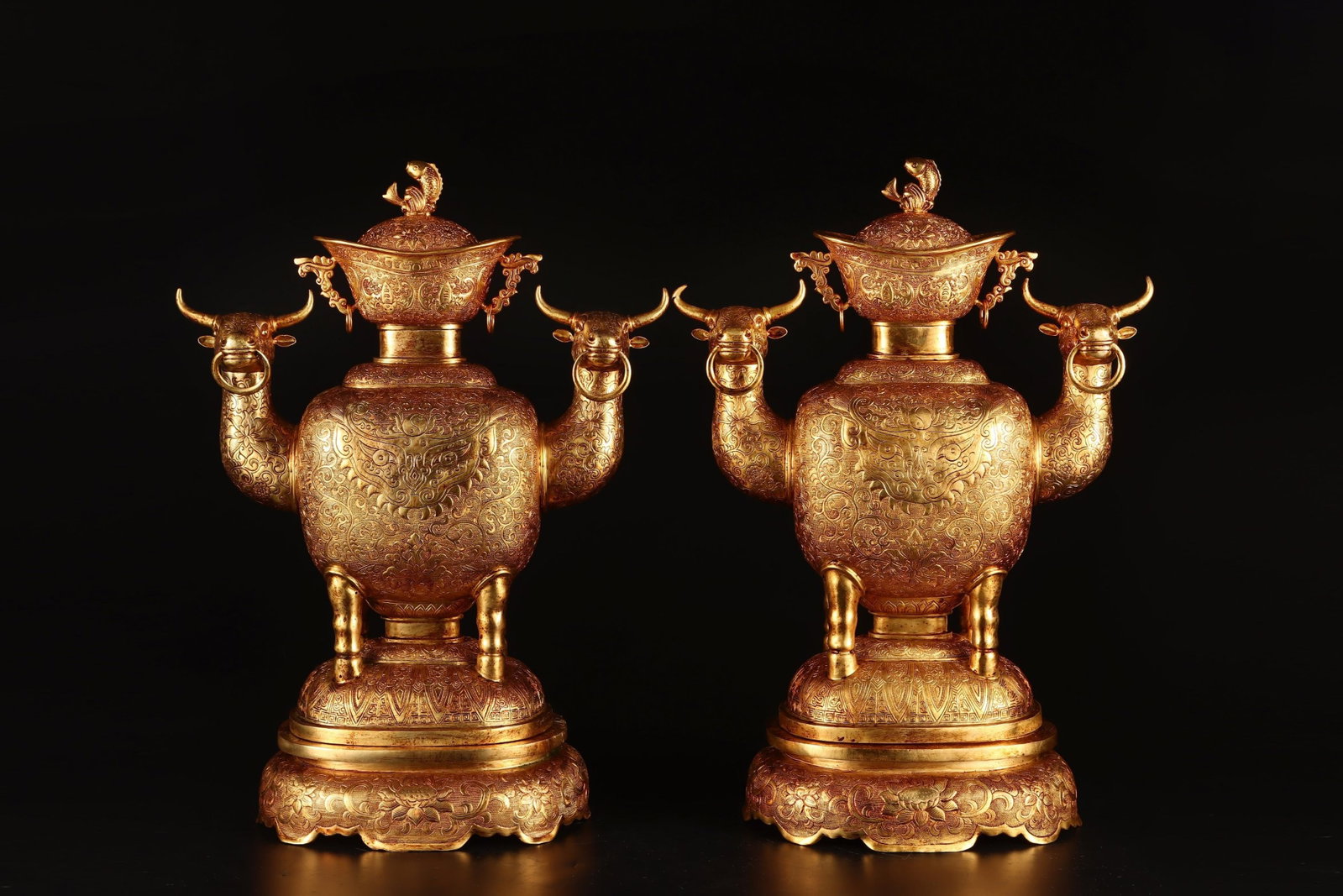 A Pair of Rare Gilt Bronze Lotus and Beast-Face Pattern Buffalo-Ears Censers: A Pair of Rare Gilt Bronze Lotus and Beast-Face Pattern Buffalo-Ears Censers,Tang Dynasty,China,Zhenguan Four-character Mark,Size:13inx11.8in,Total Weight:6920g 一对铜鎏金
