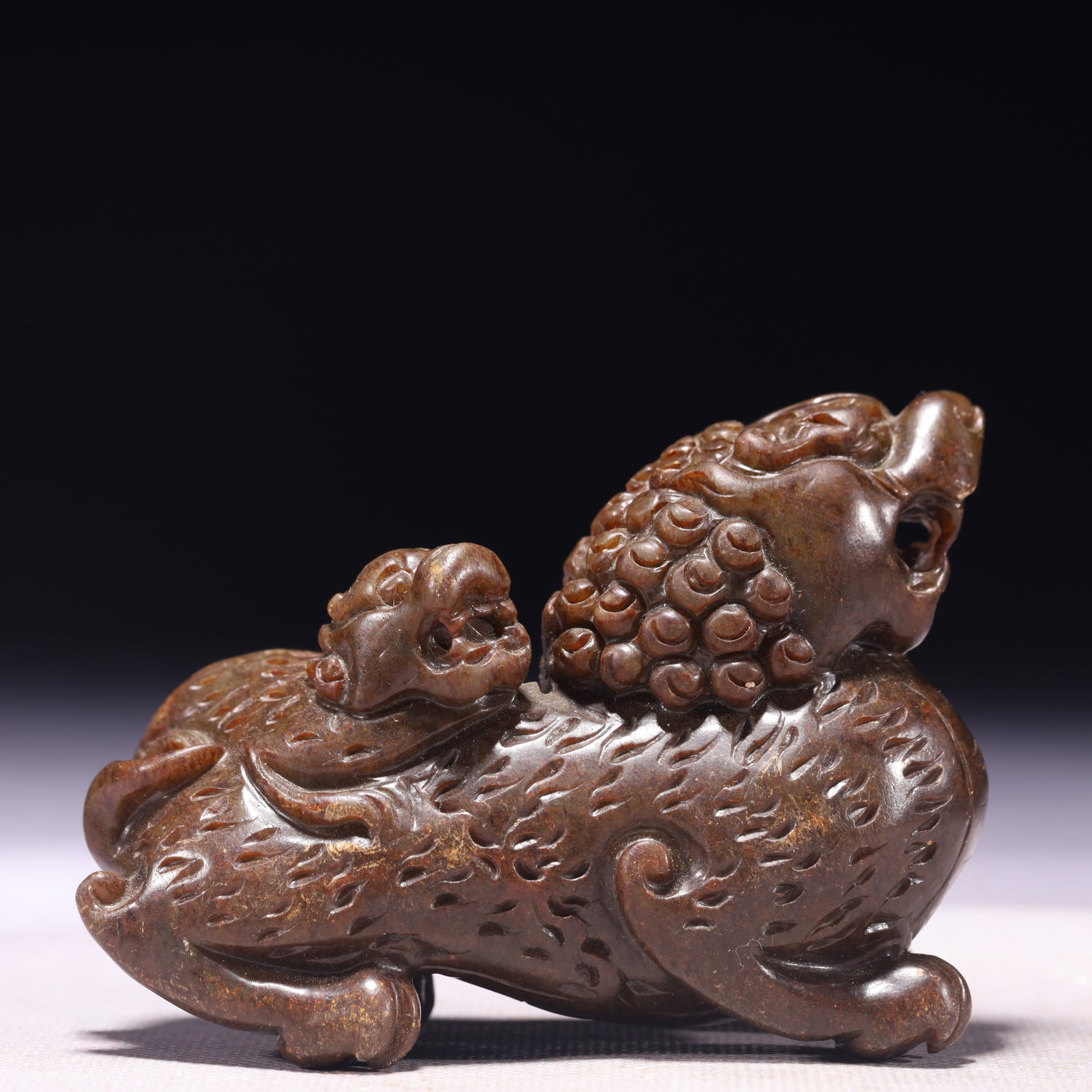 An Exquisite Archaic Jade Lion Ornament: An Exquisite Archaic Jade Lion Ornament,Ancient Time,China,Size:3.5inx1.6inx2.8in,Weight:328g 高古玉狮子摆件,中国远古时期