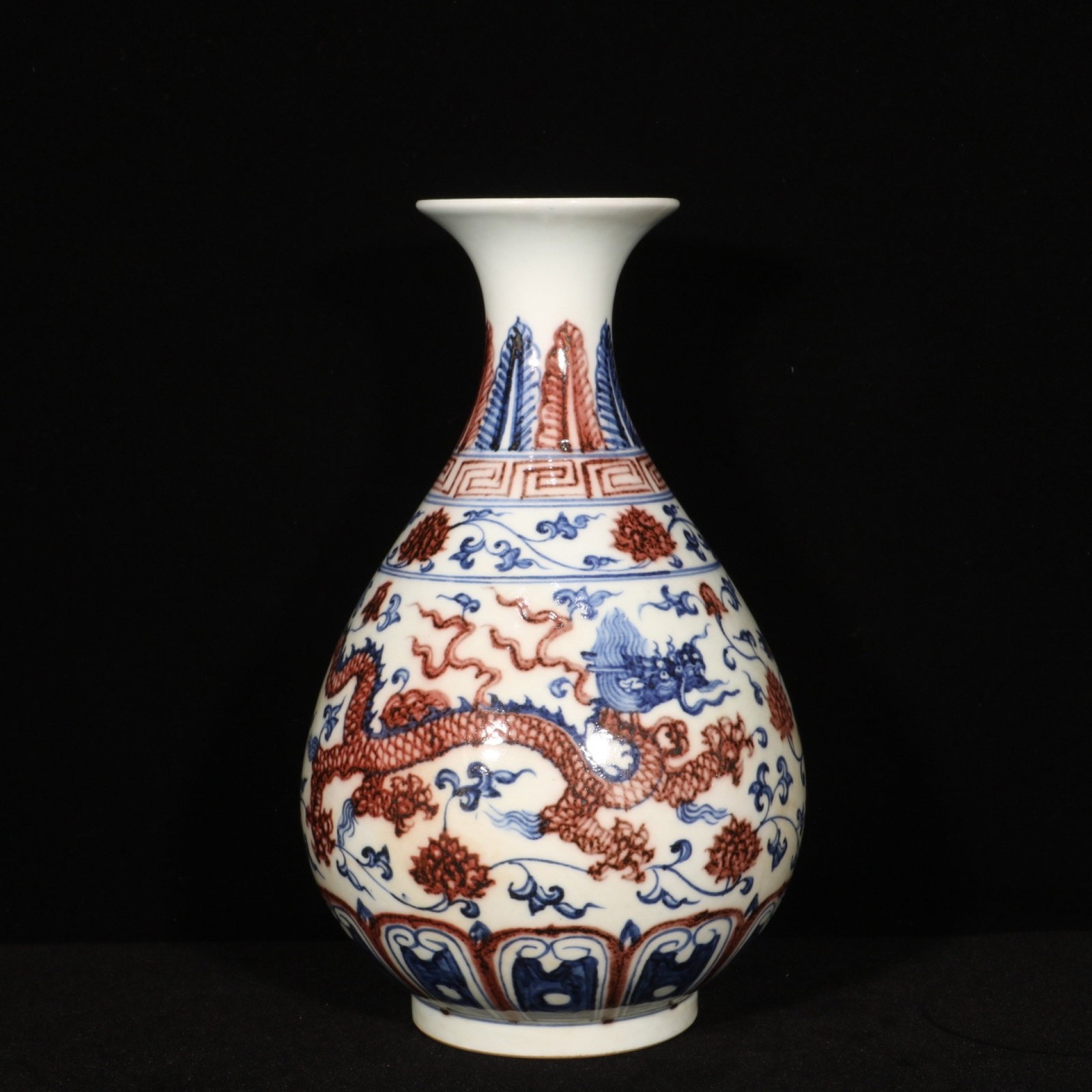 An Exquisite Blue and White Underglaze-Red Lotus and Dragon Pattern Vase: An Exquisite Blue and White Underglaze-Red Lotus and Dragon Pattern Vase,Ming Dynasty,China,Xuande Six-character Mark,Size:10.4inx6.1in 青花釉里红缠枝莲