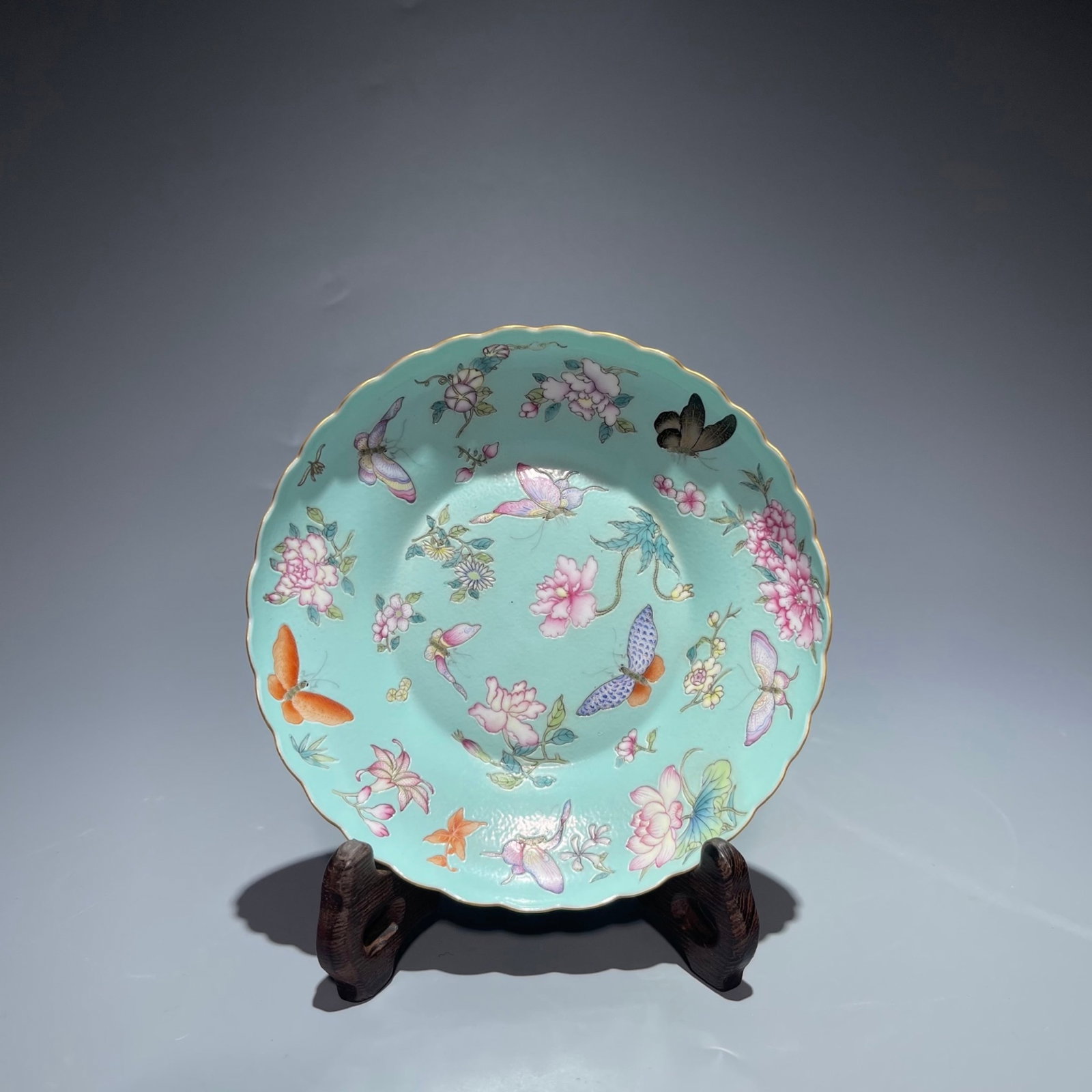 An Exquisite Turquoise Glazed Famille-Rose Flower and Butterfly Pattern Plate (1 of 9)