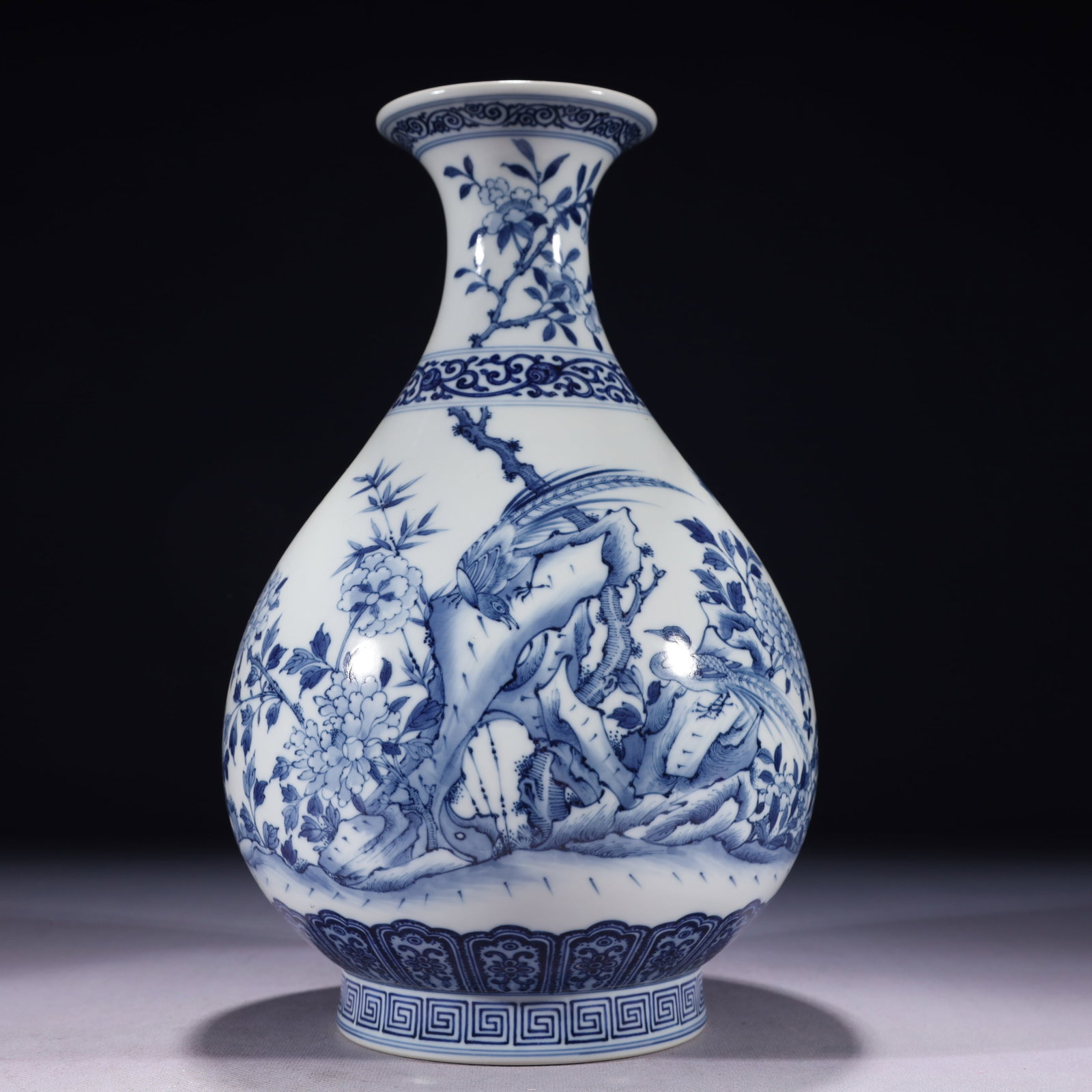 An Exquisite Blue and White Flower and Bird Pattern Vase: An Exquisite Blue and White Flower and Bird Pattern Vase,Qing Dynasty,China,Qianlong Six-character Mark,Size:6.7inx12.2in,Weight:2150g 青花花鸟纹瓶,中国