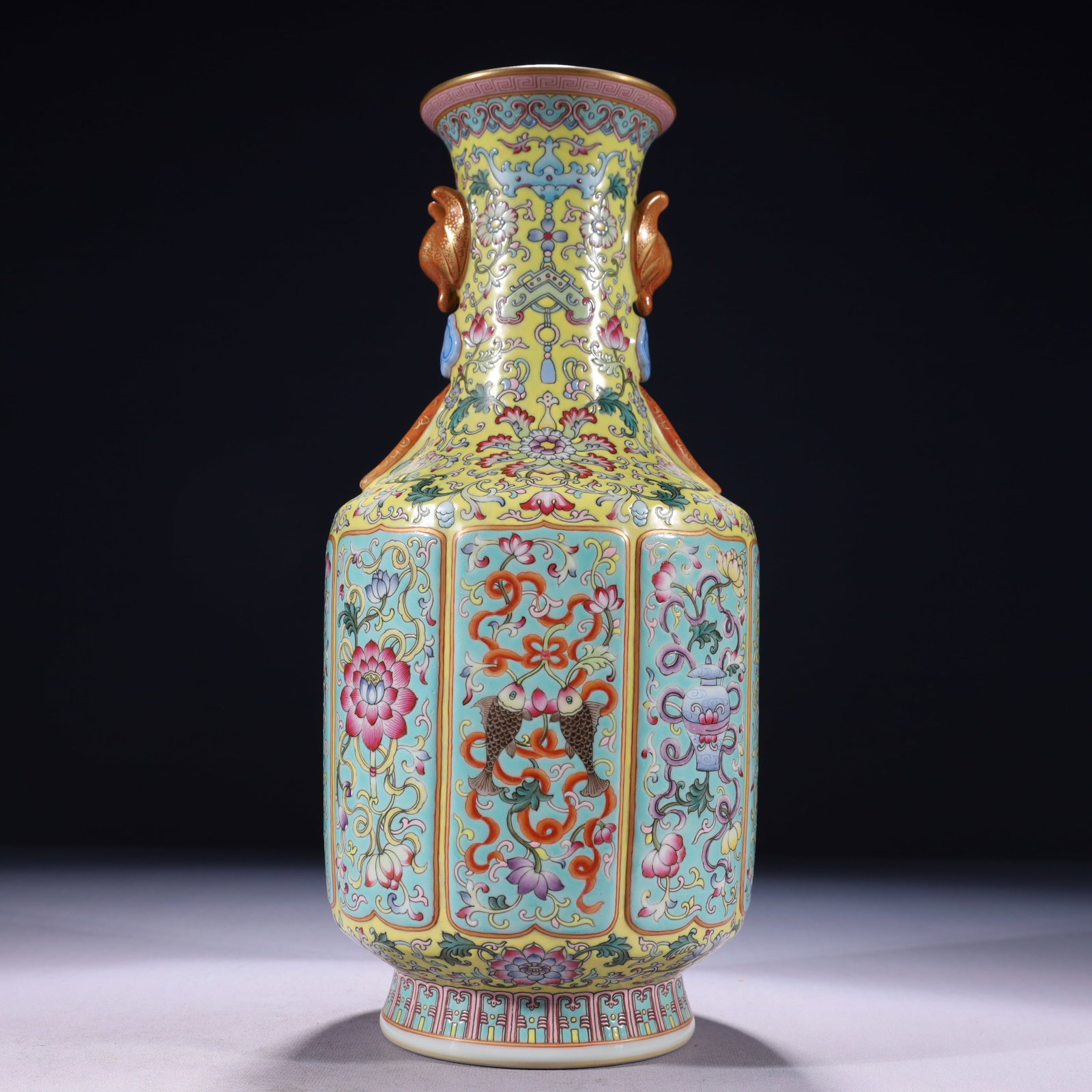 An Exquisite Green Ground Enamel Painted Gold Eight Treasures Pattern Beast-Ears Vase: An Exquisite Green Ground Enamel Painted Gold Eight Treasures Pattern Beast-Ears Vase,Qing Dynasty,China,Qianlong Six-character Mark,Size:5.5inx13.4in,Weight:2350g
