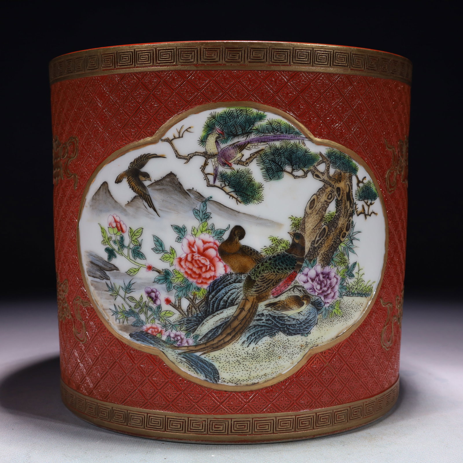 An Exquisite Red Ground Famille-Rose Painted Gold Flower and Bird Pattern Brush Pot: An Exquisite Red Ground Famille-Rose Painted Gold Flower and Bird Pattern Brush Pot,Qing Dynasty,China,Qianlong Six-character Mark,Size:8.7inx8.1in,Weight:4550g 红地粉彩描