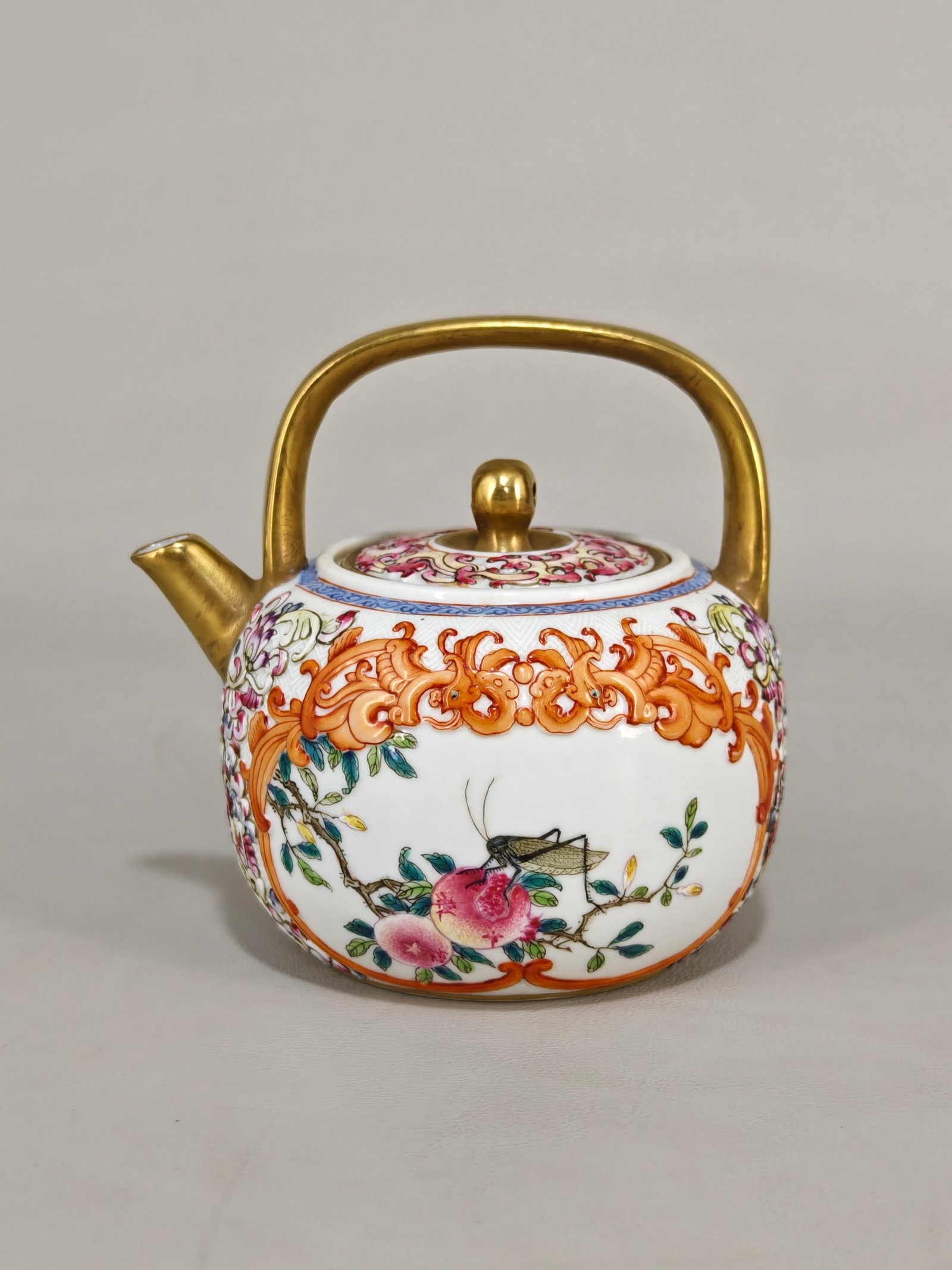 An Exquisite Famille-Rose Painted Gold Lotus Pattern Teapot: An Exquisite Famille-Rose Painted Gold Lotus Pattern Teapot,Qing Dynasty,China,Qianlong Six-character Mark,Size:3.9inx3.9in