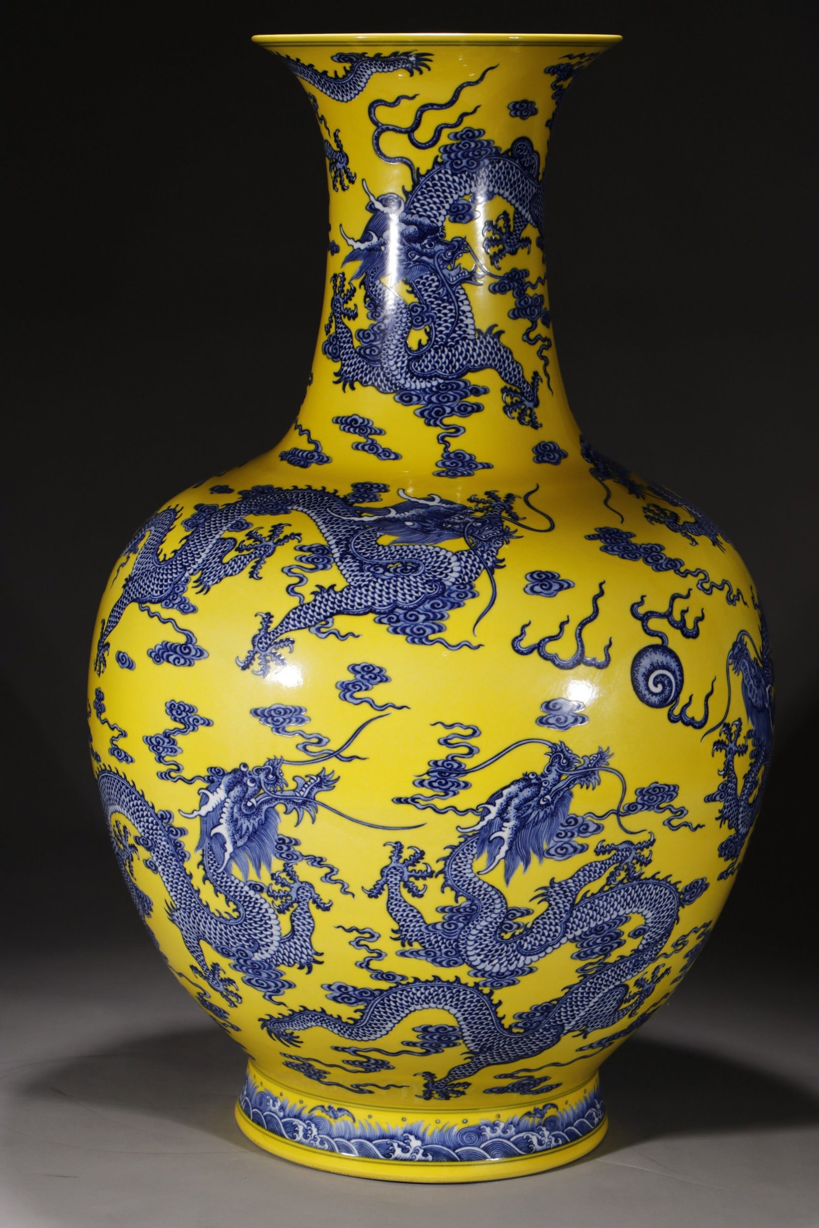 A Huge Yellow Ground Blue and White Auspicious Cloud and Dragon Pattern Vase: A Huge Yellow Ground Blue and White Auspicious Cloud and Dragon Pattern Vase,Qing Dynasty,China,Qianlong Six-character Mark,Size:27.8in