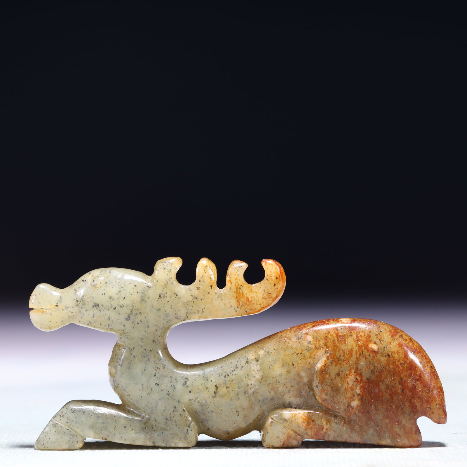 An Exquisite White Jade Deer Ornament: An Exquisite White Jade Deer Ornament,Qing Dynasty,China,Size:3.3inx0.5inx1.6in,Weight:74.8g 白玉鹿摆件,中国清代