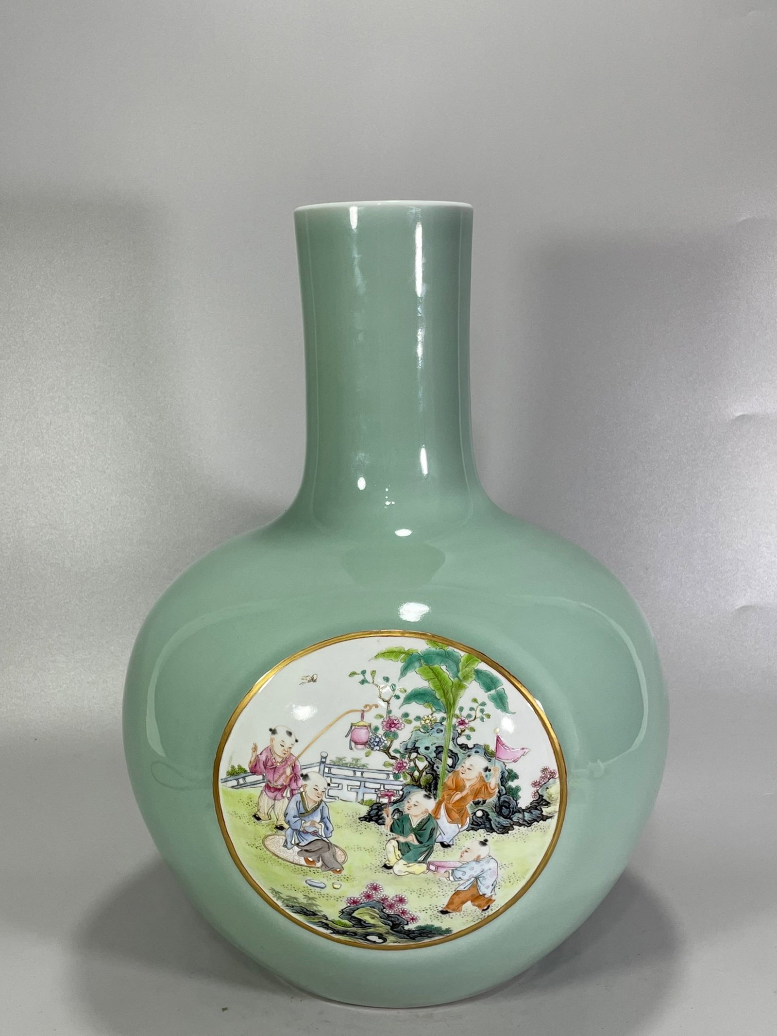 A Huge Celadon Glazed Famille-Rose Character and Story Pattern Vase: A Huge Celadon Glazed Famille-Rose Character and Story Pattern Vase,Qing Dynasty,China,Qianlong Six-character Mark,Size:17.1inx12.6in 青釉粉彩人物故事&#