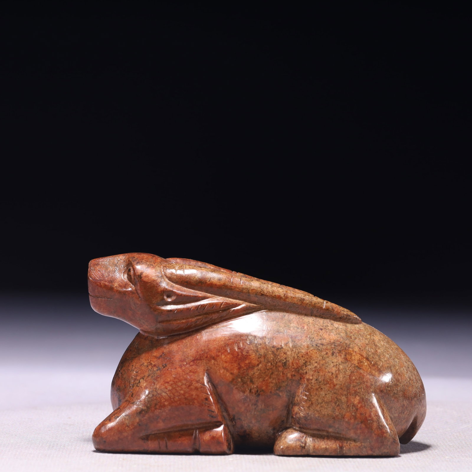 An Exquisite Archaic Jade Rabbit Ornament: An Exquisite Archaic Jade Rabbit Ornament,Ancient Time,China,Size:3.9inx1.8inx2.4in,Weight:440g 高古玉兔子摆件,中国远古时期