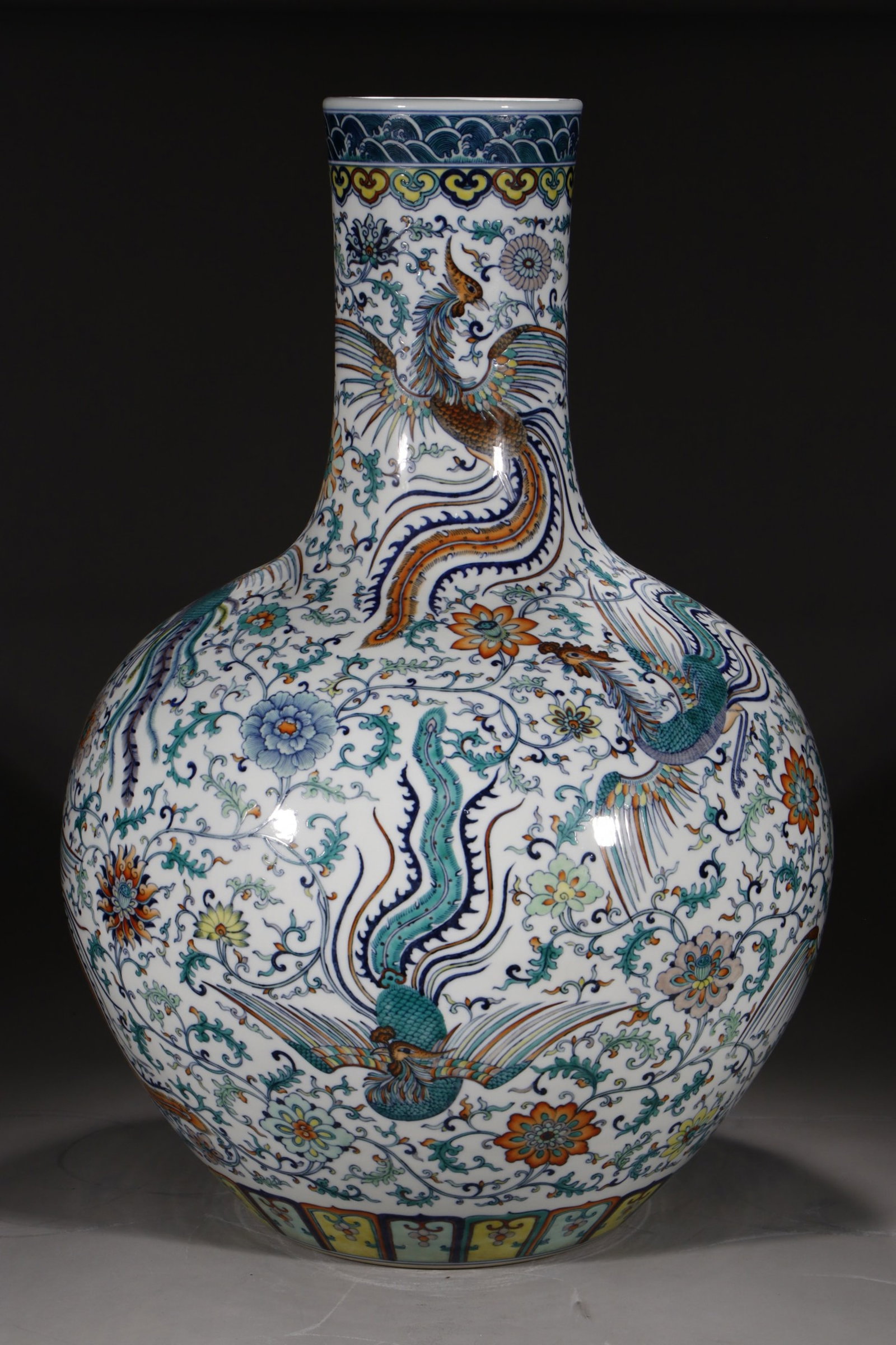 A Huge Doucai Lotus and Phoenix Pattern Vase: A Huge Doucai Lotus and Phoenix Pattern Vase,Qing Dynasty,China,Qianlong Six-character Mark,Size:30.3in 斗彩缠枝莲凤纹瓶,中国清代