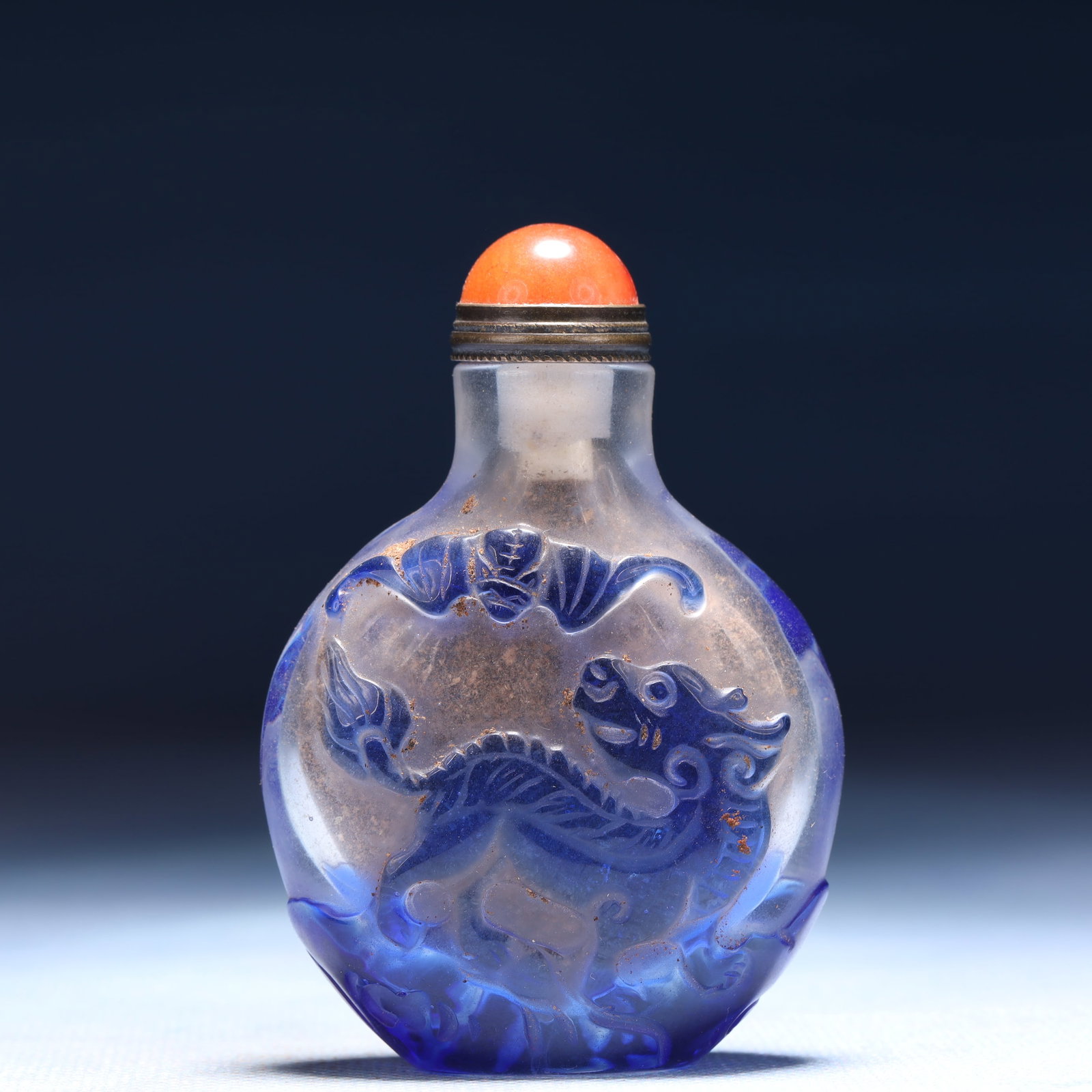 An Exquisite Glass Auspicious Beast Pattern Snuff Bottle: An Exquisite Glass Auspicious Beast Pattern Snuff Bottle,Qing Dynasty,China,Size:2inx1inx2.8in,Weight:66g