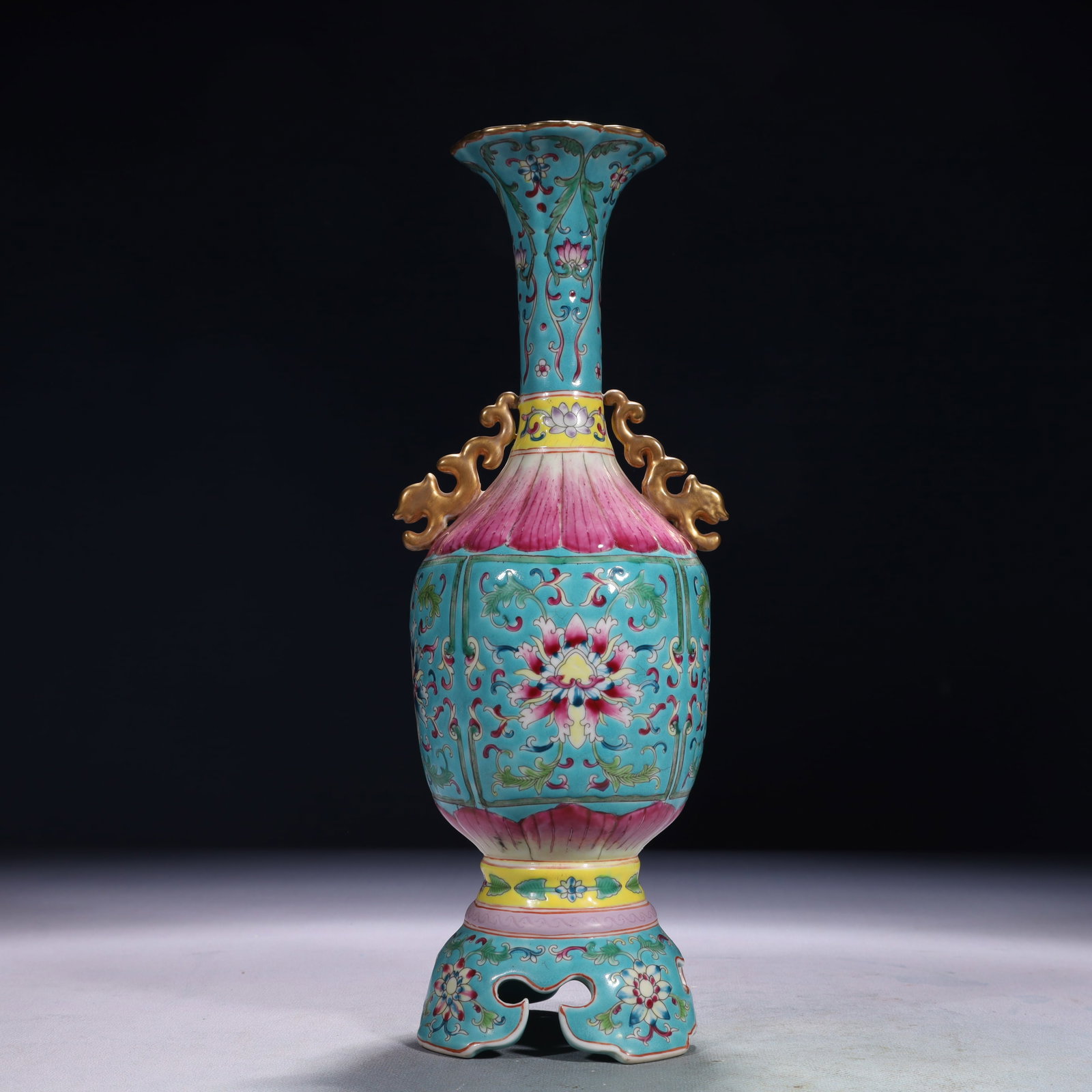 An Exquisite Turquoise Glazed Famille-Rose Lotus Pattern Double-Ears Vase: An Exquisite Turquoise Glazed Famille-Rose Lotus Pattern Double-Ears Vase,Qing Dynasty,China,Yongzheng Four-character Mark,Size:4.3inx11.4in,Weight:800g