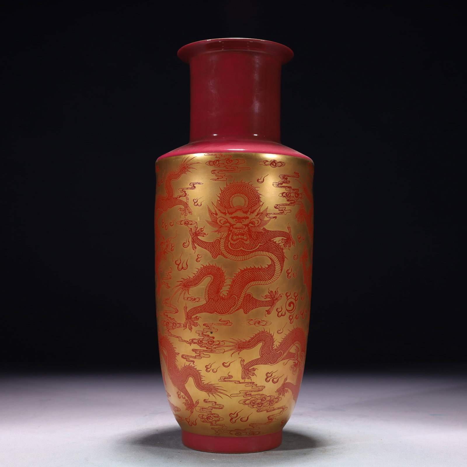 An Exquisite Ruby Red-Glazed Painted Gold Auspicious Cloud and Dragon Pattern Vase: An Exquisite Ruby Red-Glazed Painted Gold Auspicious Cloud and Dragon Pattern Vase,Qing Dynasty,China,Qianlong Four-character Mark,Size:4.7inx12.2in,Weight:700g 胭脂红描金