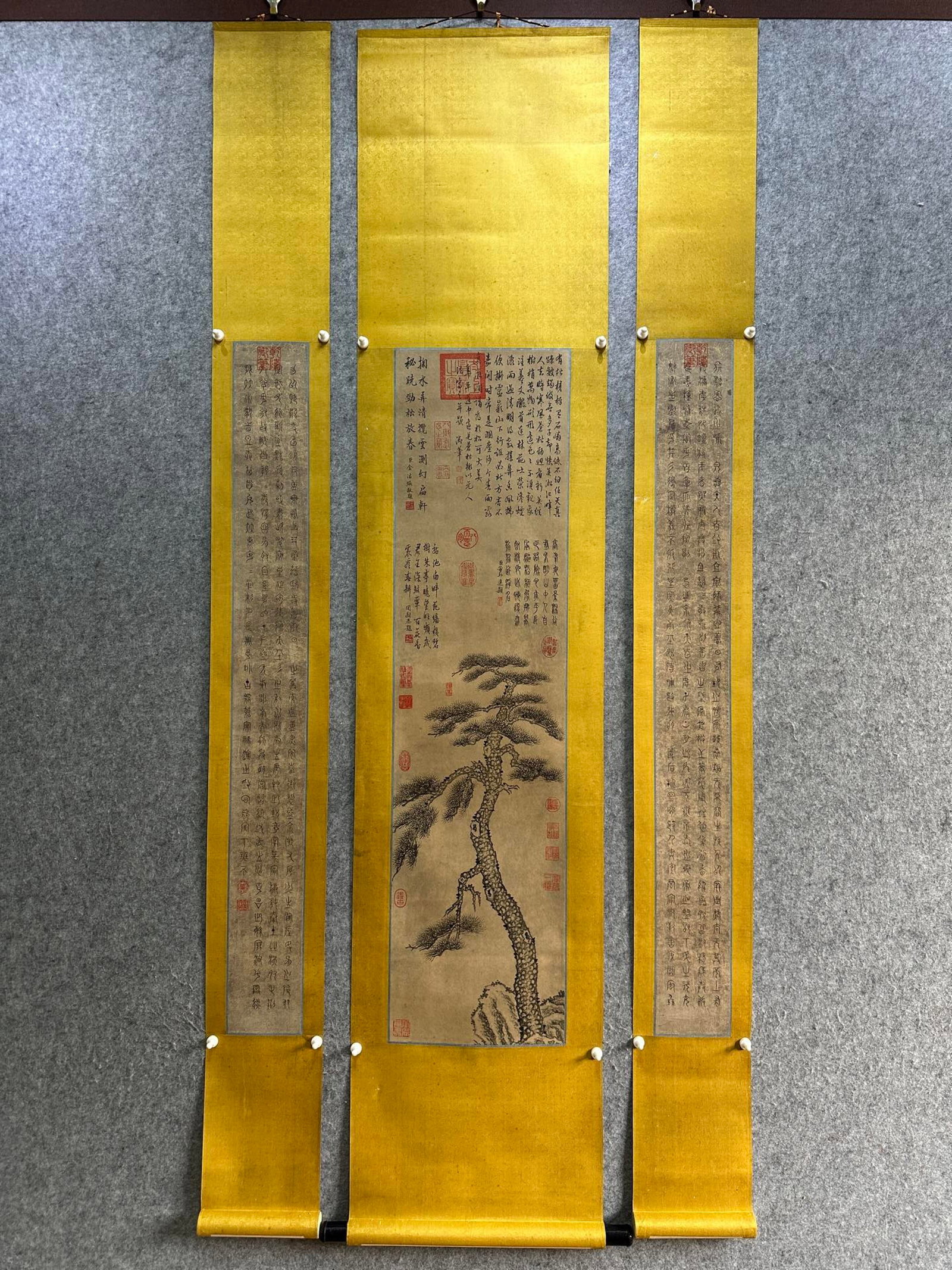 A Set of Chinese Vertical Scroll Ink Painting of Pine on Paper: A Set of Chinese Vertical Scroll Ink Painting of Pine on Paper,Qianlong,Size:(Without frame)48.4inx5.1in,(Couplet)48.4inx5.1in 一套中国水墨松树画&