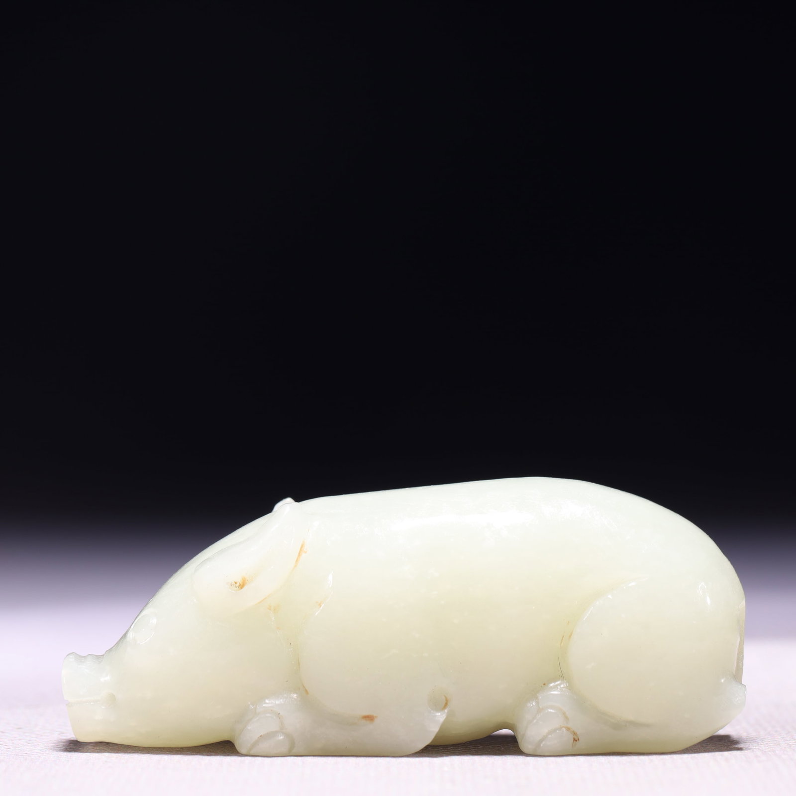 A Rare White Jade Pig Ornament: A Rare White Jade Pig Ornament,Qing Dynasty,China,Size:2.8inx0.8inx1.1in,Weight:94g 白玉猪摆件,中国清代