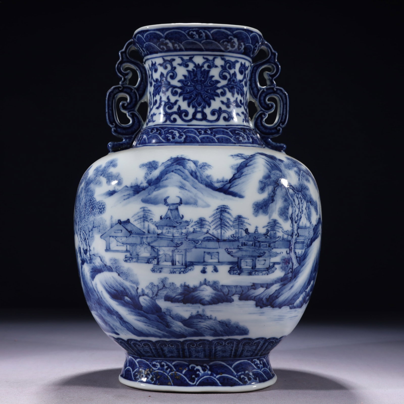 An Exquisite Blue and White Landscape Pattern Double-Ears Vase: An Exquisite Blue and White Landscape Pattern Double-Ears Vase,Qing Dynasty,China,Qianlong Six-character Mark,Size:7.5inx5.9inx11.8in,Weight:3400g 青花山水纹双ň