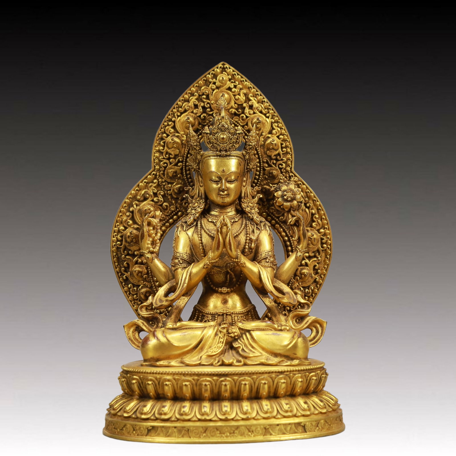 A Solemn Gilt Bronze Statue of Four-arms Guanyin: A Solemn Gilt Bronze Statue of Four-arms Guanyin ,Qing Dynasty, China,Size:4.3inx3.1inx6.9in,Weight:900g 铜鎏金四臂观音像,中国清ߣ