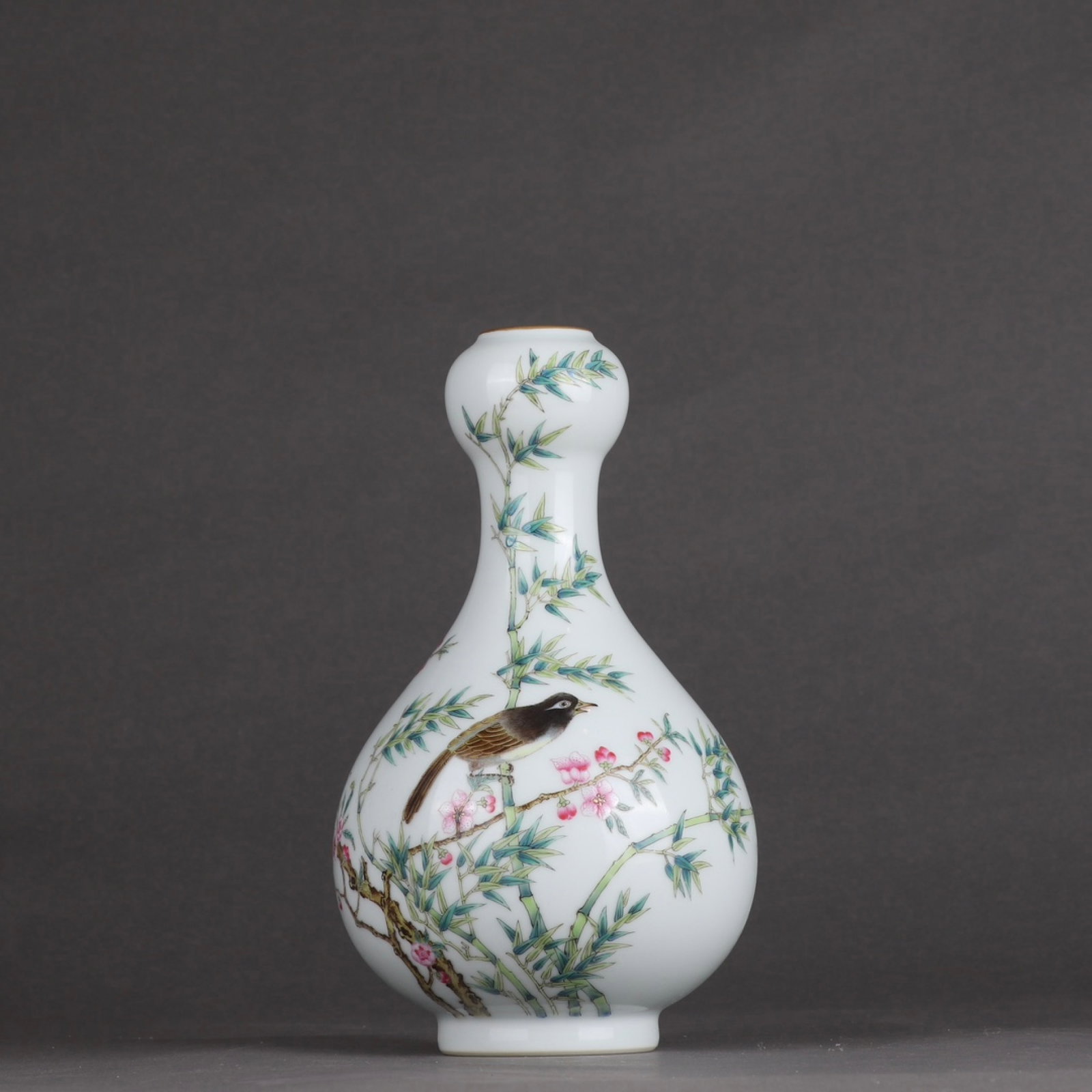 An Exquisite Famille-Rose Painted Gold Flower and Bird Pattern Vase: An Exquisite Famille-Rose Painted Gold Flower and Bird Pattern Vase,Qing Dynasty,China,Qianlong Six-character Mark,Size:7.7inx4.3in 粉彩描金花鸟纹瓶,