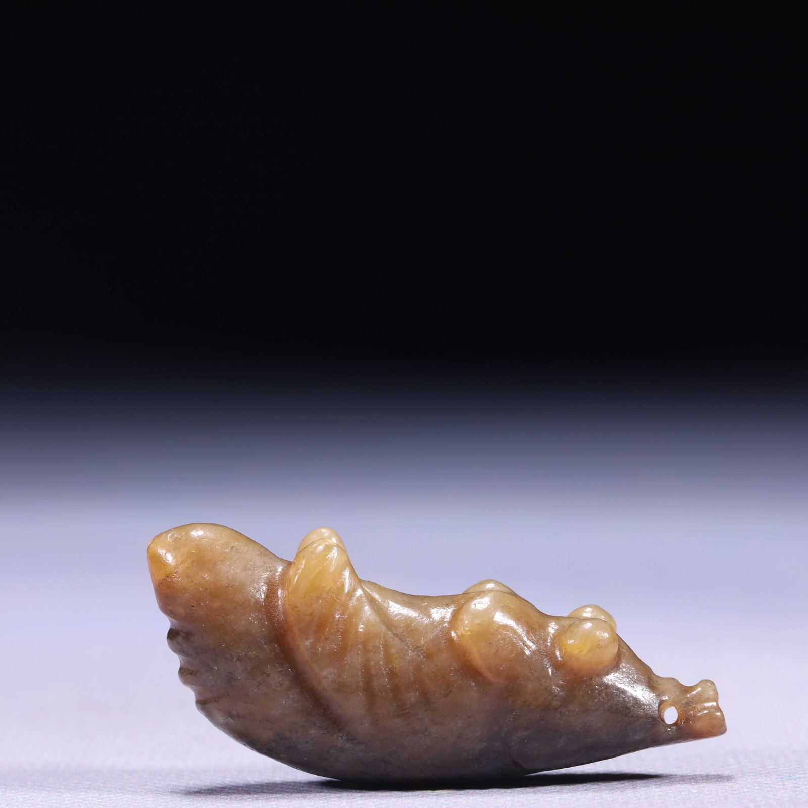 An Exquisite Archaic Jade Beast Ornament (1 of 5)