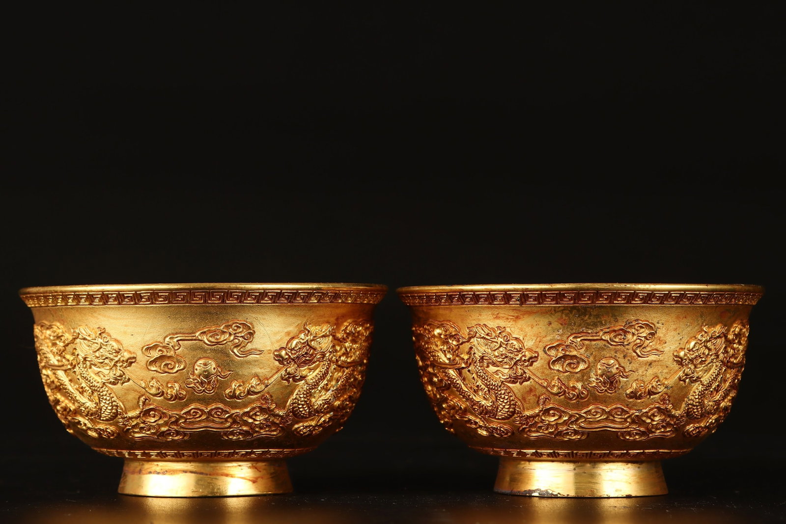 A Pair of Exquisite Gilt Bronze Auspicious Cloud and Dragon Pattern Bowls: A Pair of Exquisite Gilt Bronze Auspicious Cloud and Dragon Pattern Bowls,Qing Dynasty,China,Jiajing Four-character Mark,Size:2inx3.5in,Weight:360g 一对铜鎏金祥