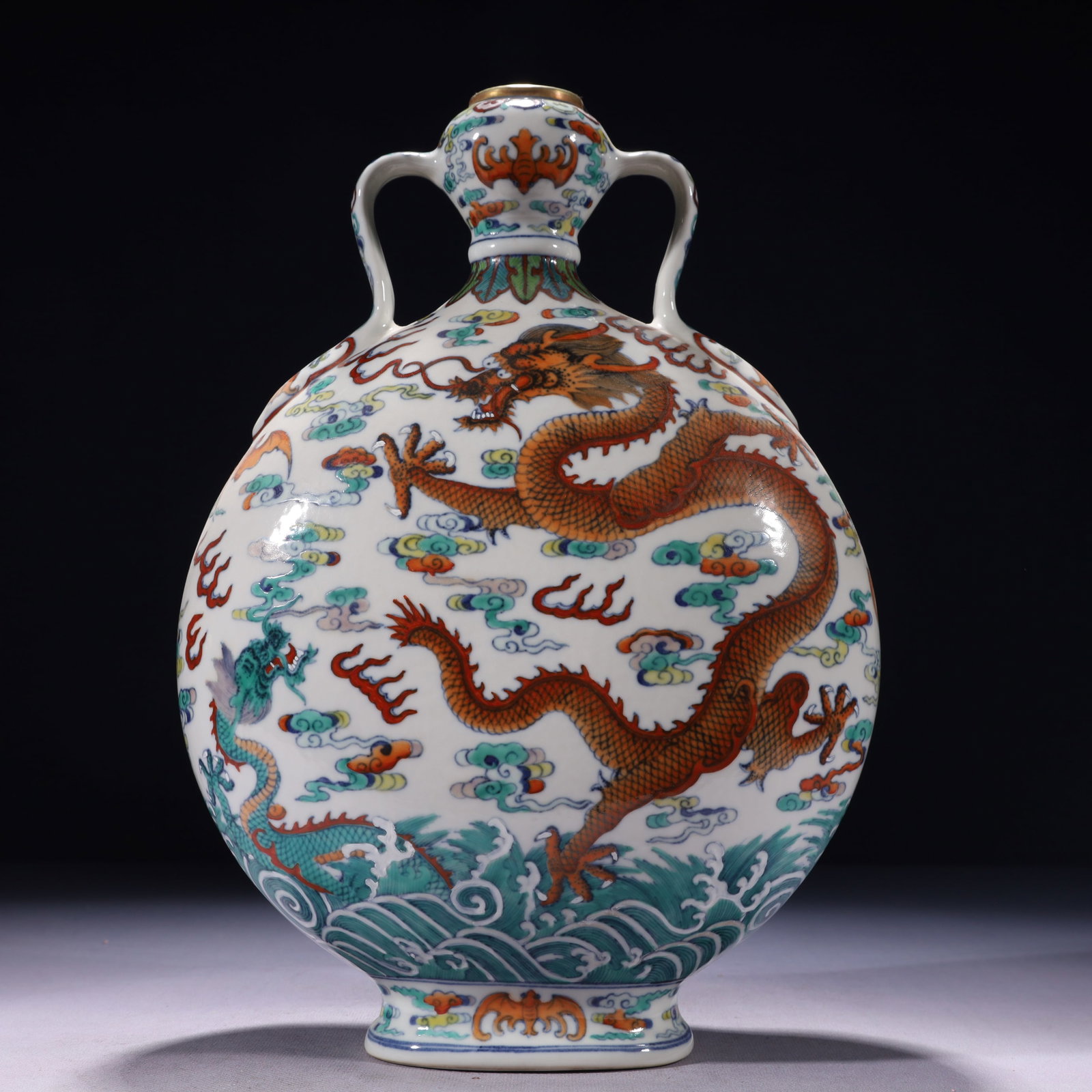 An Exquisite Blue and White Doucai Painted Gold Auspicious Cloud and Dragon Pattern Double-Ears Vase: An Exquisite Blue and White Doucai Painted Gold Auspicious Cloud and Dragon Pattern Double-Ears Vase,Qing Dynasty,China,Qianlong Six-character Mark,Size:9.4inx4.3inx13in,Weight:2550g 青花&