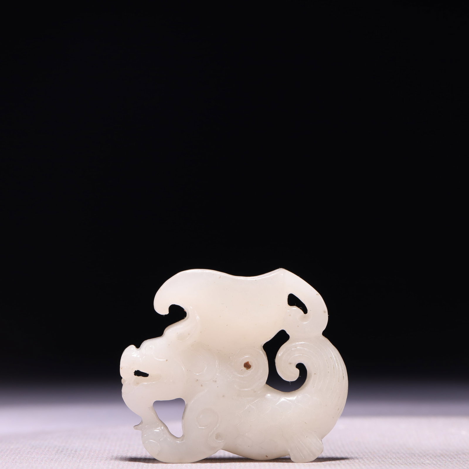 A Rare White Jade Beast Cup: A Rare White Jade Beast Cup,Qing Dynasty,China,Size:2inx0.4inx1.8in,Weight:50g 白玉兽杯子,中国清代