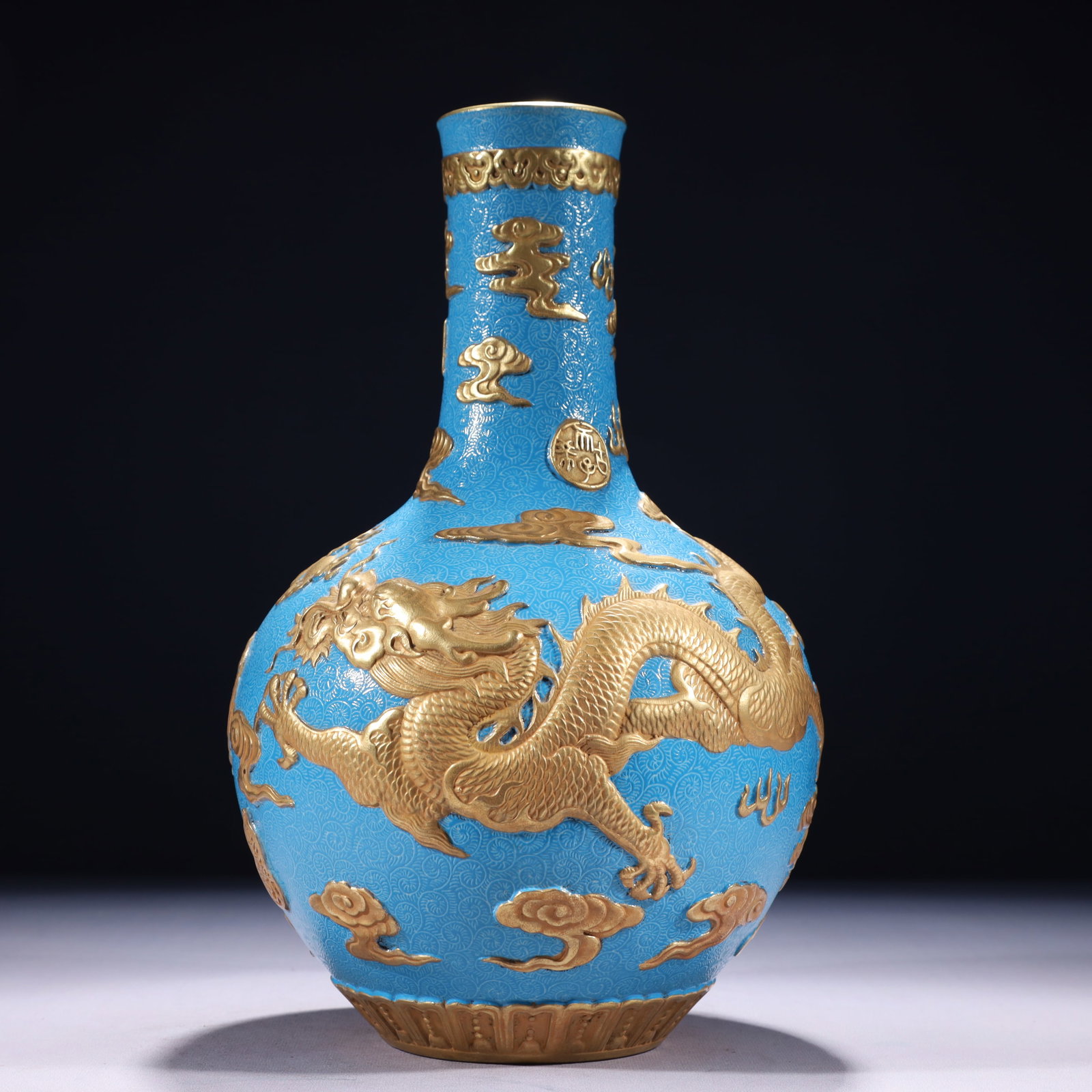 An Exquisite Turquoise Glazed Gold Ground Dragon and Phoenix Pattern Vase: An Exquisite Turquoise Glazed Gold Ground Dragon and Phoenix Pattern Vase,Qing Dynasty,China,Qianlong Six-character Mark,Size:7.5inx13.4in,Weight:3000g