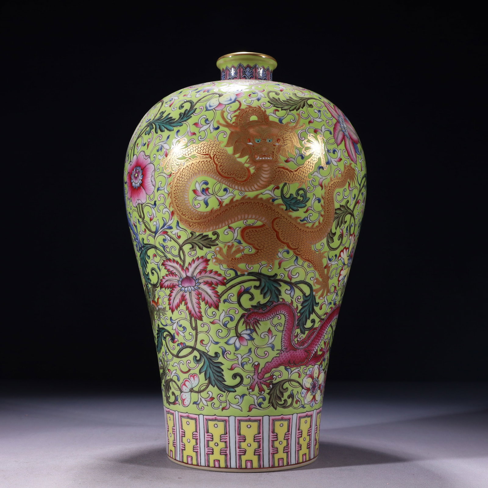An Exquisite Green Ground Famille-Rose Painted Gold Lotus and Dragon Pattern Vase: An Exquisite Green Ground Famille-Rose Painted Gold Lotus and Dragon Pattern Vase,Qing Dynasty,China,Yongzheng Six-character Mark,Size:7.5inx13.8in,Weight:2350g