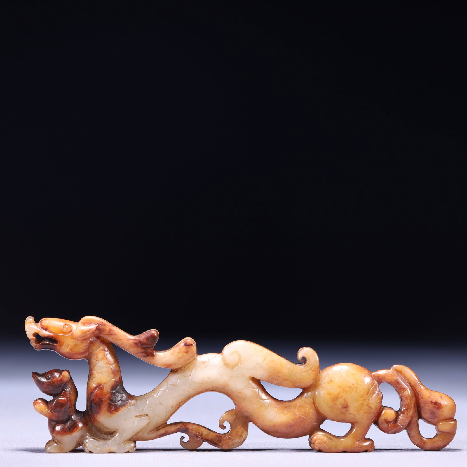 An Exquisite Archaic Jade Dragon Ornament: An Exquisite Archaic Jade Dragon Ornament,Ancient Time,China,Size:5.9inx0.5inx2in,Weight:115g 高古玉龙摆件,中国远古时期