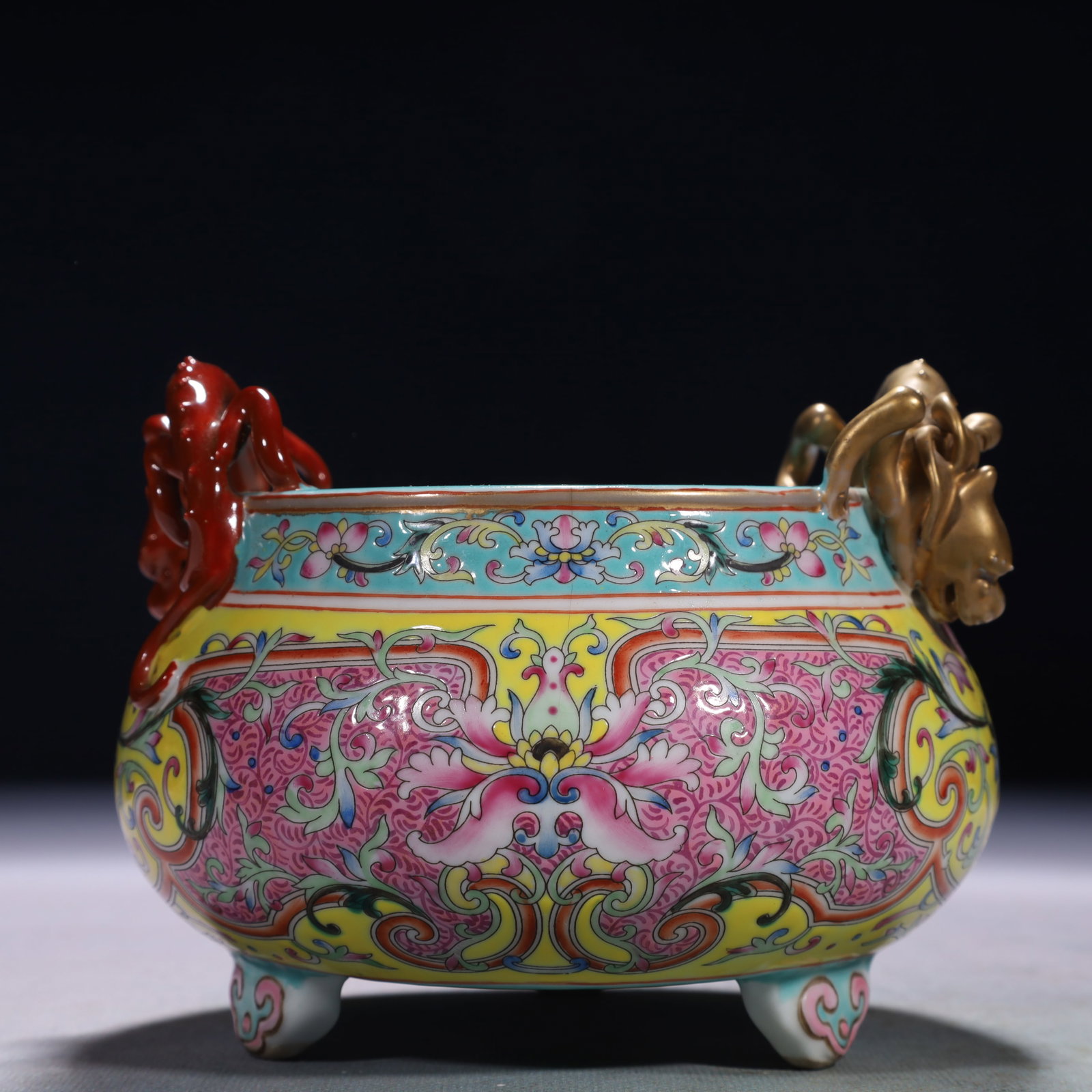 An Exquisite Yellow Ground Famille-Rose Lotus Pattern Double-Ears and Tripod Censer: An Exquisite Yellow Ground Famille-Rose Lotus Pattern Double-Ears and Tripod Censer,Qing Dynasty,China,Qianlong Four-character Mark,Size:5.1inx4.3in,Weight:1000g 黄地粉彩ಶ