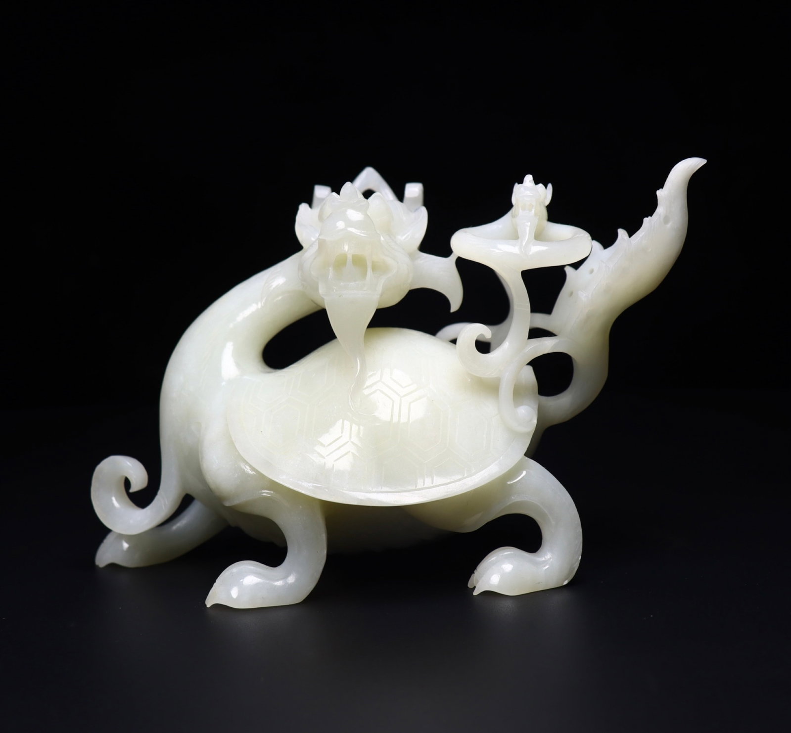 An Exquisite White Jade Dragon and Turtle Ornament: An Exquisite White Jade Dragon and Turtle Ornament,Qing Dynasty, China,Size:7.1inx3.7inx4.7in,Weight:1040g 白玉龙龟摆件,中国清代